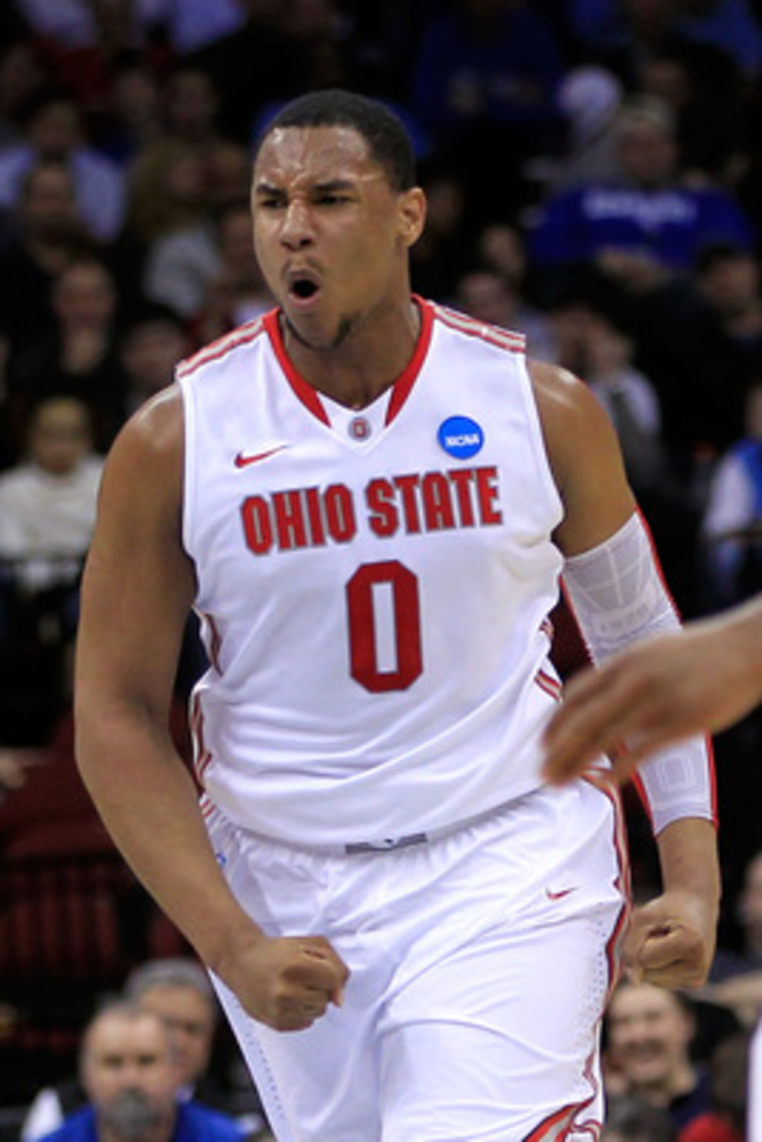 NEWARK, NJ - MARCH 25: Jared Sullinger #0 of the Ohio State Buckeyes celebrates after a play against the Kentucky Wildcats during the first half of the east regional semifinal of the 2011 NCAA Men's Basketball Tournament at the Prudential Center on March NEWARK, NJ - MARCH 25: Jared Sullinger #0 of the Ohio State Buckeyes celebrates after a play against the Kentucky Wildcats during the first half of the east regional semifinal of the 2011 NCAA Men's Basketball Tournament at the Prudential Center on March