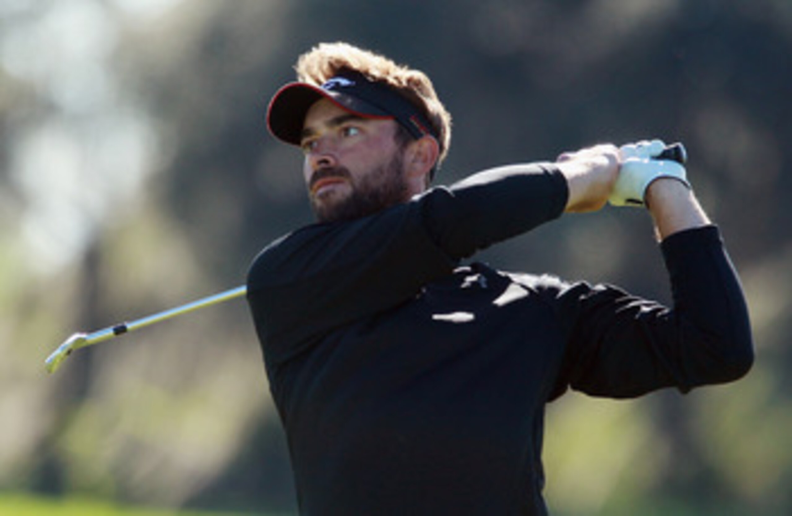 WINTER GARDEN, FL - DECEMBER 06:  Ty Tryon hits a shot during the final round of the PGA Tour Qualifying Tournament at Orange County National on December 6, 2010 in Winter Garden, Florida.  (Photo by Scott Halleran/Getty Images)