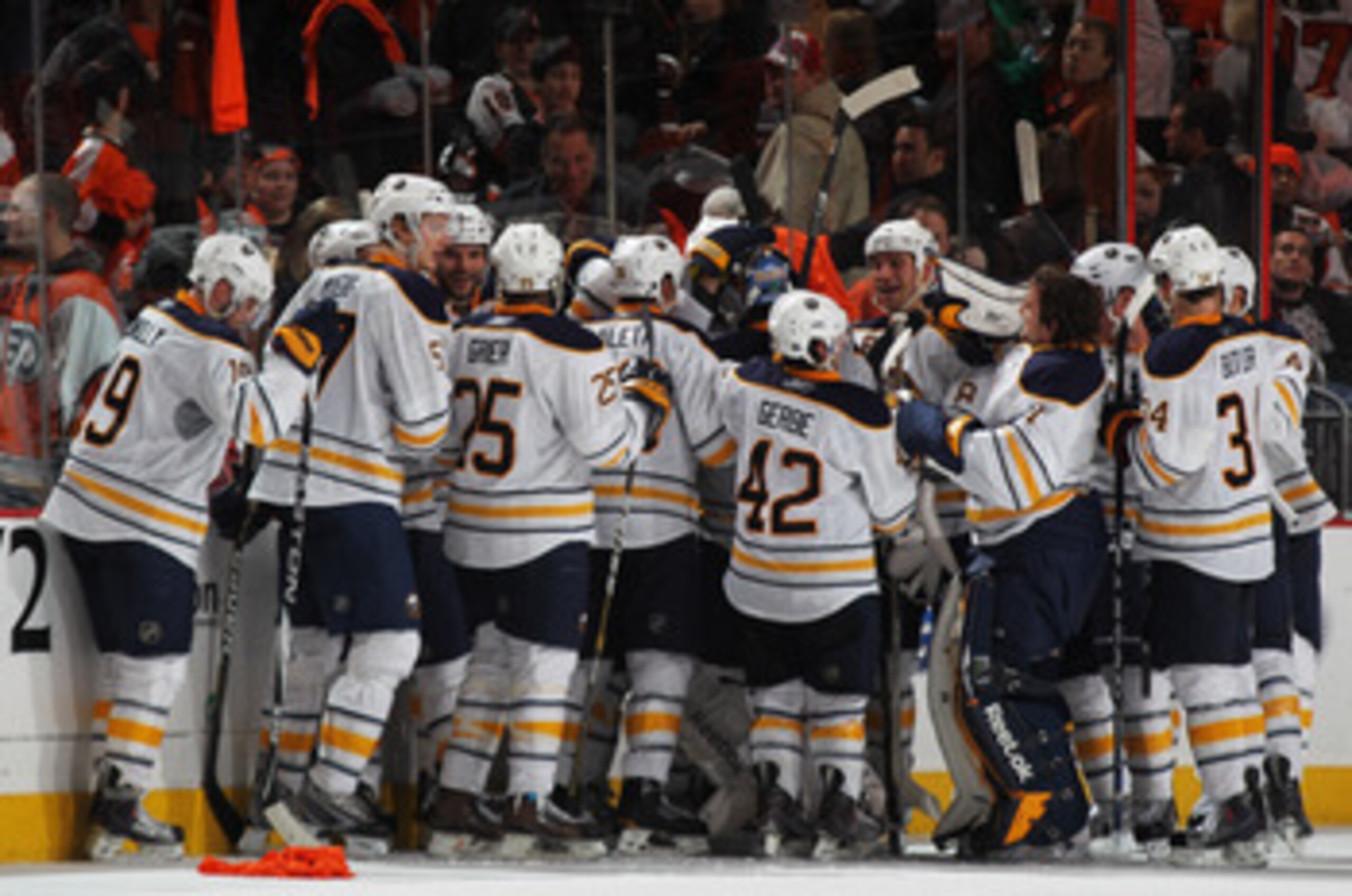 PHILADELPHIA, PA - APRIL 22: Tyler Ennis #63 of the Buffalo Sabres celebrates with teammates after scoring the game winning goal in overtime in Game Five of the Eastern Conference Quarterfinals during the 2011 NHL Stanley Cup Playoffs at Wells Fargo Cent PHILADELPHIA, PA - APRIL 22: Tyler Ennis #63 of the Buffalo Sabres celebrates with teammates after scoring the game winning goal in overtime in Game Five of the Eastern Conference Quarterfinals during the 2011 NHL Stanley Cup Playoffs at Wells Fargo Cent