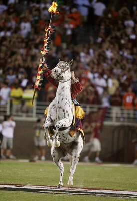 TALLAHASSEE, FL - SEPTEMBER 07:  Renegade rears up as Chief Osceola prepares to bury his spear on the 50-yard line before the Miami Hurricanes take on the Florida State Seminoles at Doak Campbell Stadium on September 7, 2009 in Tallahassee, Florida. Miami
