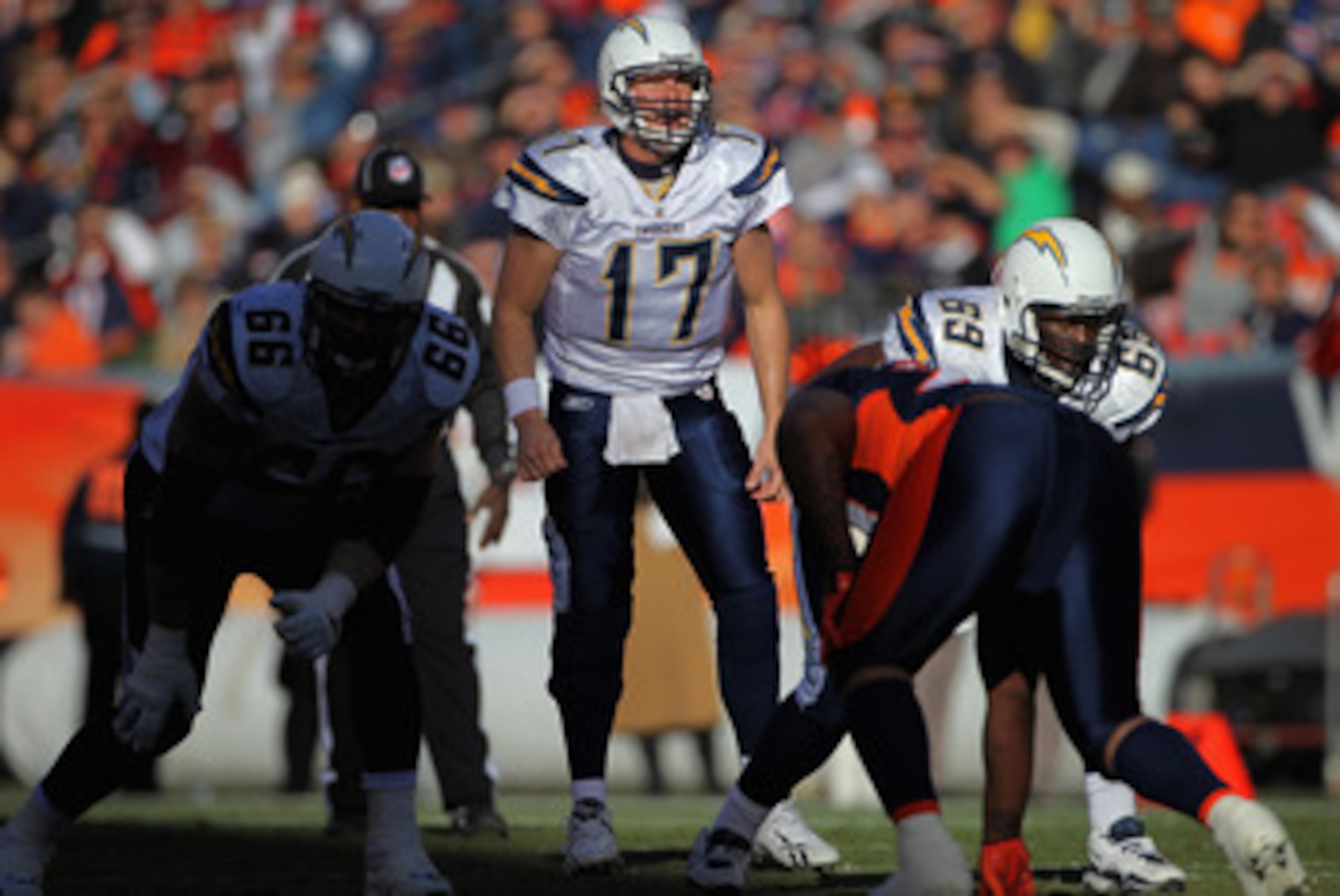 DENVER - JANUARY 02:  Quarterback Philip Rivers #17 of the San Diego Chargers runs the offense against the Denver Broncos at INVESCO Field at Mile High on January 2, 2011 in Denver, Colorado. The Chargers defeated the Broncos 33-28.  (Photo by Doug Pensin