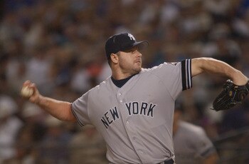 4 Nov 2001:  Roger Clemens #22 of the New York Yankees climbs up the mound during game seven of the Major League Baseball World Series at Bank One Ballpark in Phoenix, Arizona. The Diamondbacks won 3-2 to capture the World Series title. DIGITAL IMAGE. Man