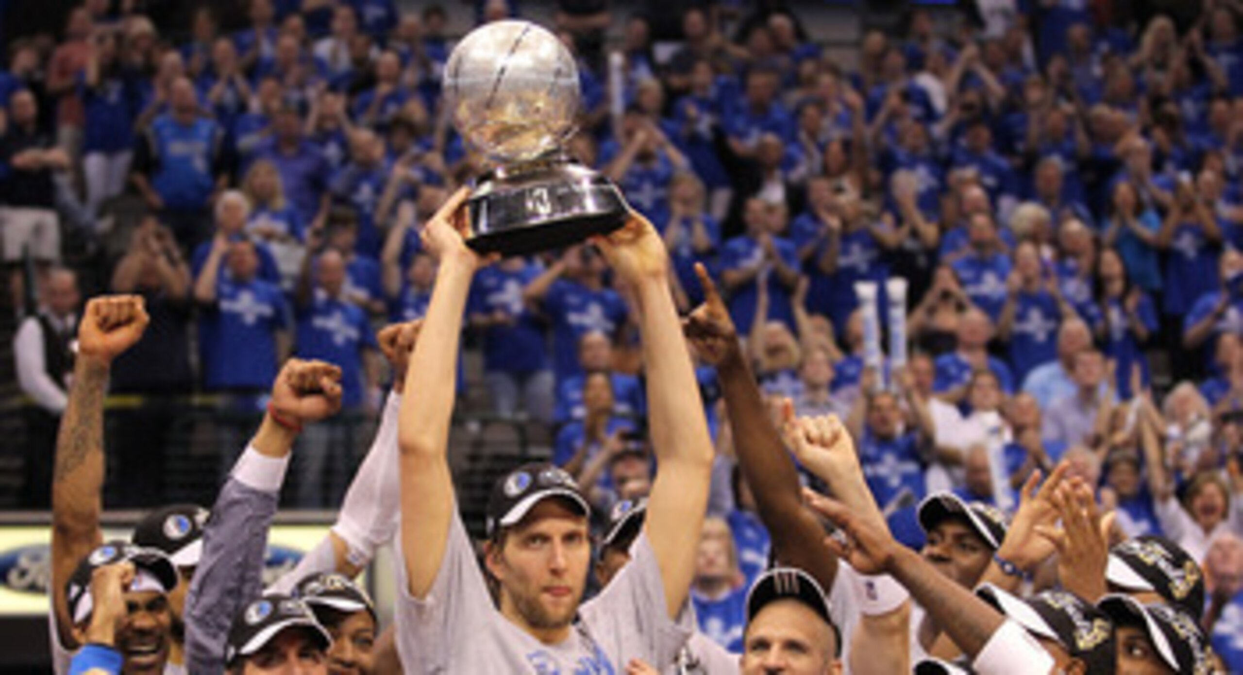 DALLAS, TX - MAY 25:  Dirk Nowitzki #41 and the Dallas Mavericks celebrate their 100-96 victory against the Oklahoma City Thunder in Game Five of the Western Conference Finals during the 2011 NBA Playoffs at American Airlines Center on May 25, 2011 in Dal