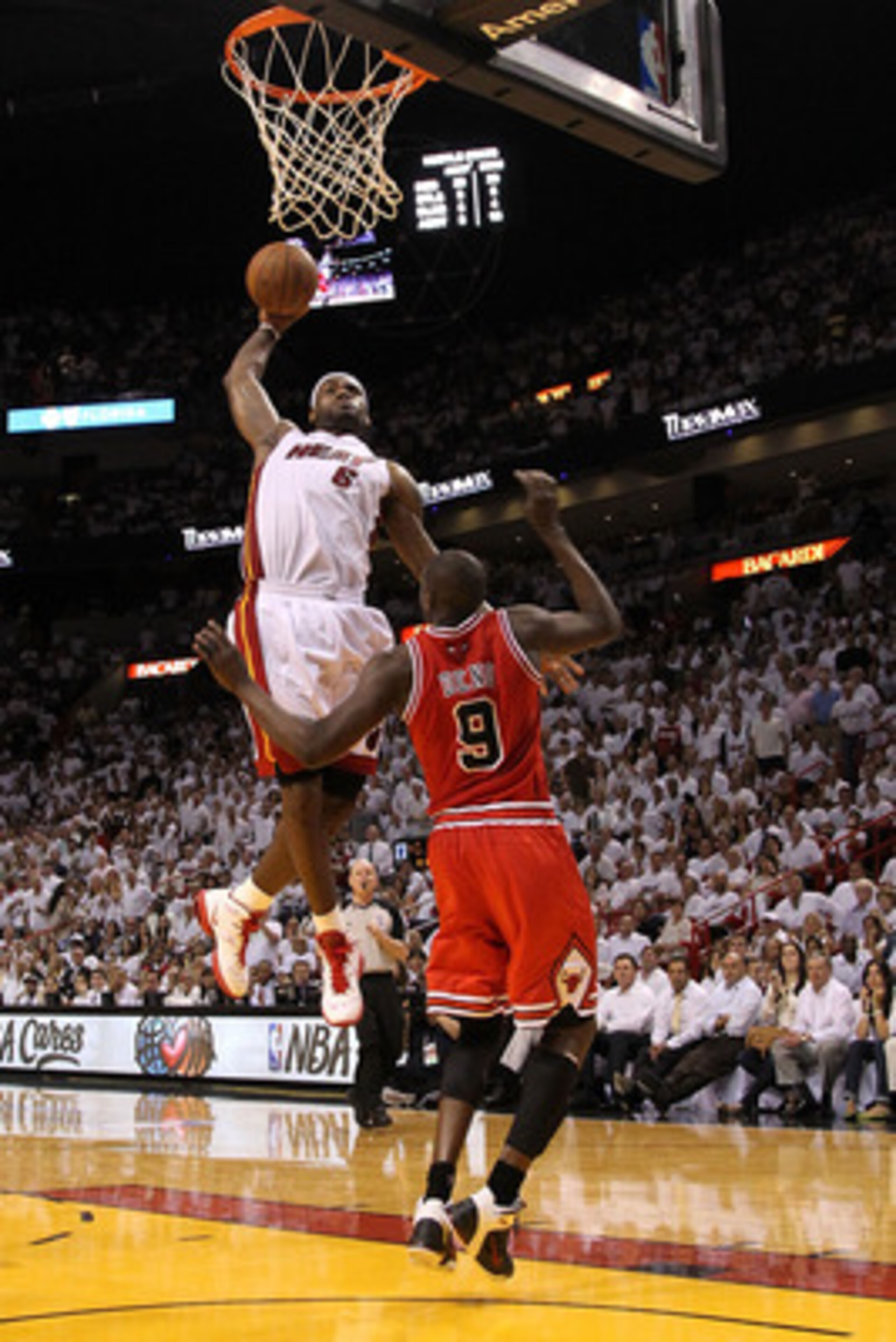 MIAMI, FL - MAY 24:  LeBron James #6 of the Miami Heat dunks on Luol Deng #9 of the Chicago Bulls  in Game Four of the Eastern Conference Finals during the 2011 NBA Playoffs on May 24, 2011 at American Airlines Arena in Miami, Florida. NOTE TO USER: User