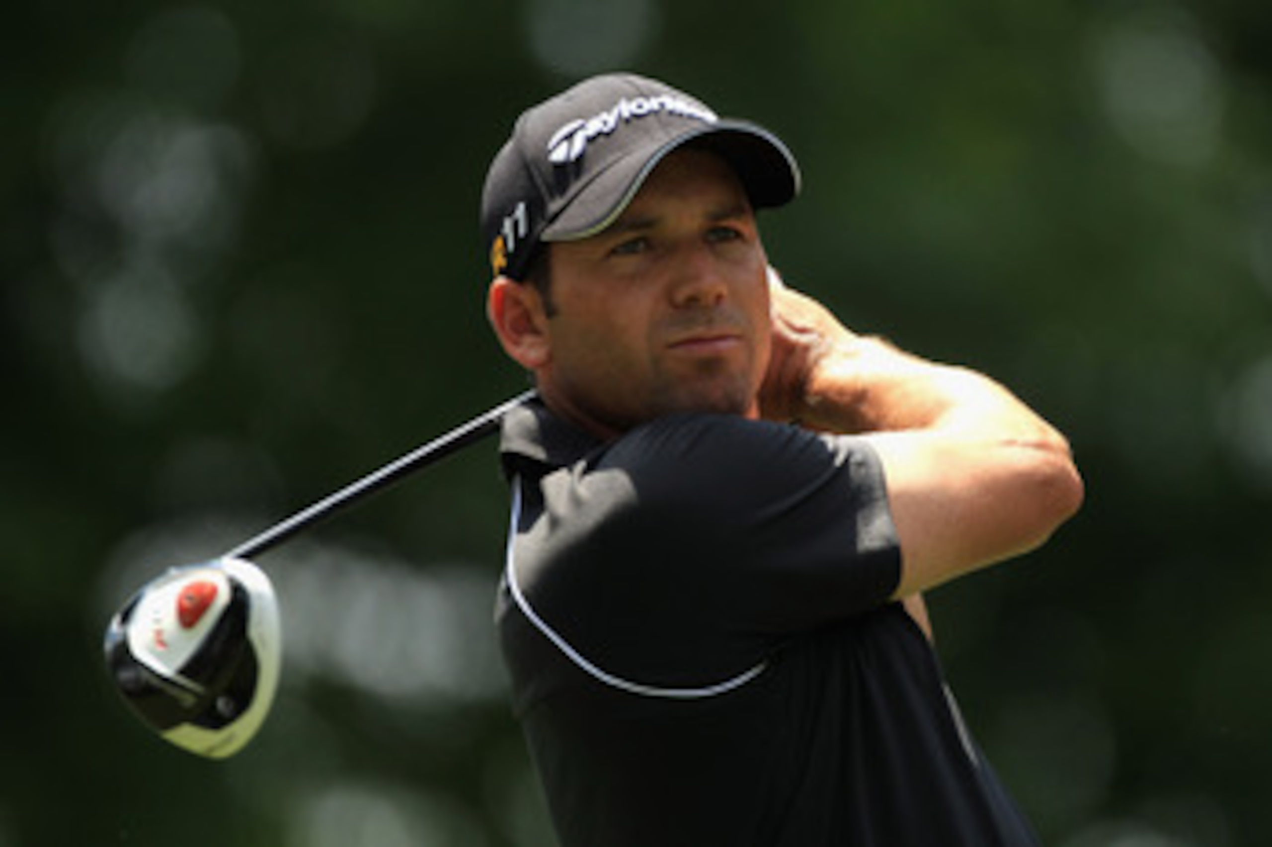 CHARLOTTE, NC - MAY 07:  Sergio Garcia hits his tee shot on the third hole during the third round of the Wells Fargo Championship at the Quail Hollow Club on May 7, 2011 in Charlotte, North Carolina.  (Photo by Streeter Lecka/Getty Images)