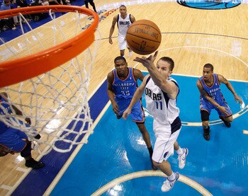 DALLAS, TX - MAY 25:  Jose Juan Barea #11 of the Dallas Mavericks goes up for a shot in front of Eric Maynor #6 of the Oklahoma City Thunder in Game Five of the Western Conference Finals during the 2011 NBA Playoffs at American Airlines Center on May 25, 