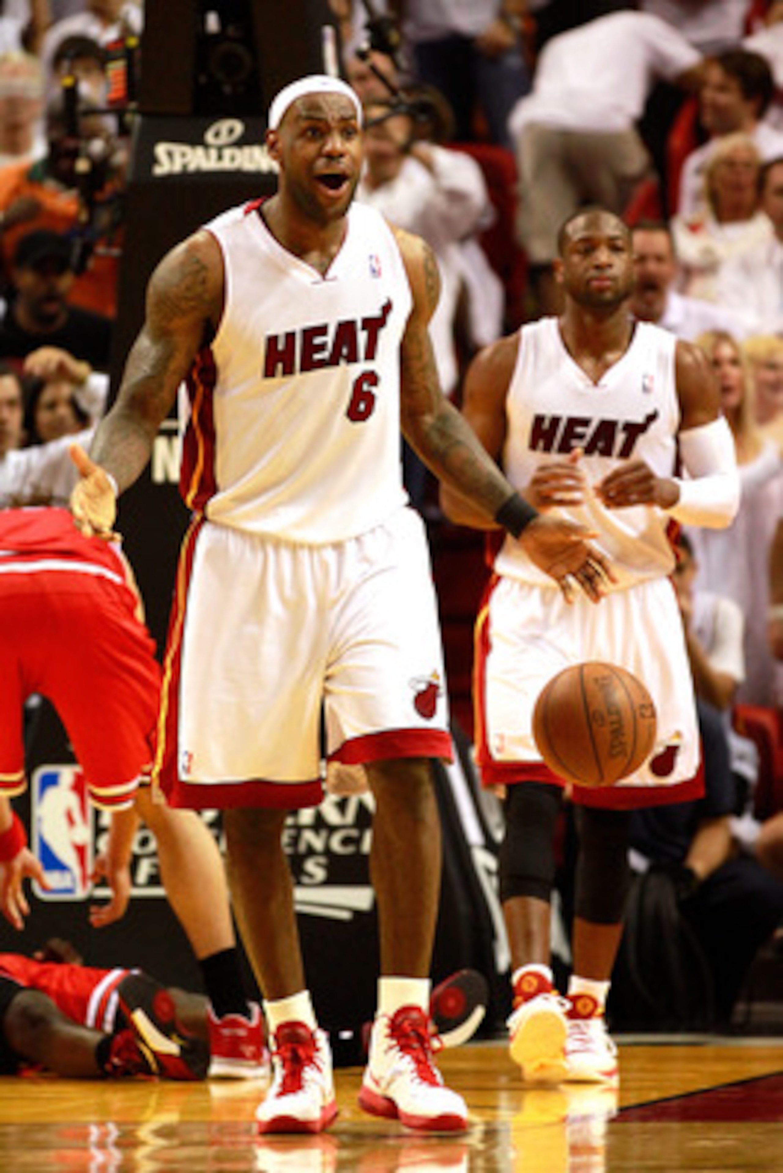 MIAMI, FL - MAY 24:  LeBron James #6 of the Miami Heat reacts against the Chicago Bulls in Game Four of the Eastern Conference Finals during the 2011 NBA Playoffs on May 24, 2011 at American Airlines Arena in Miami, Florida. Recording artist Drake NOTE TO
