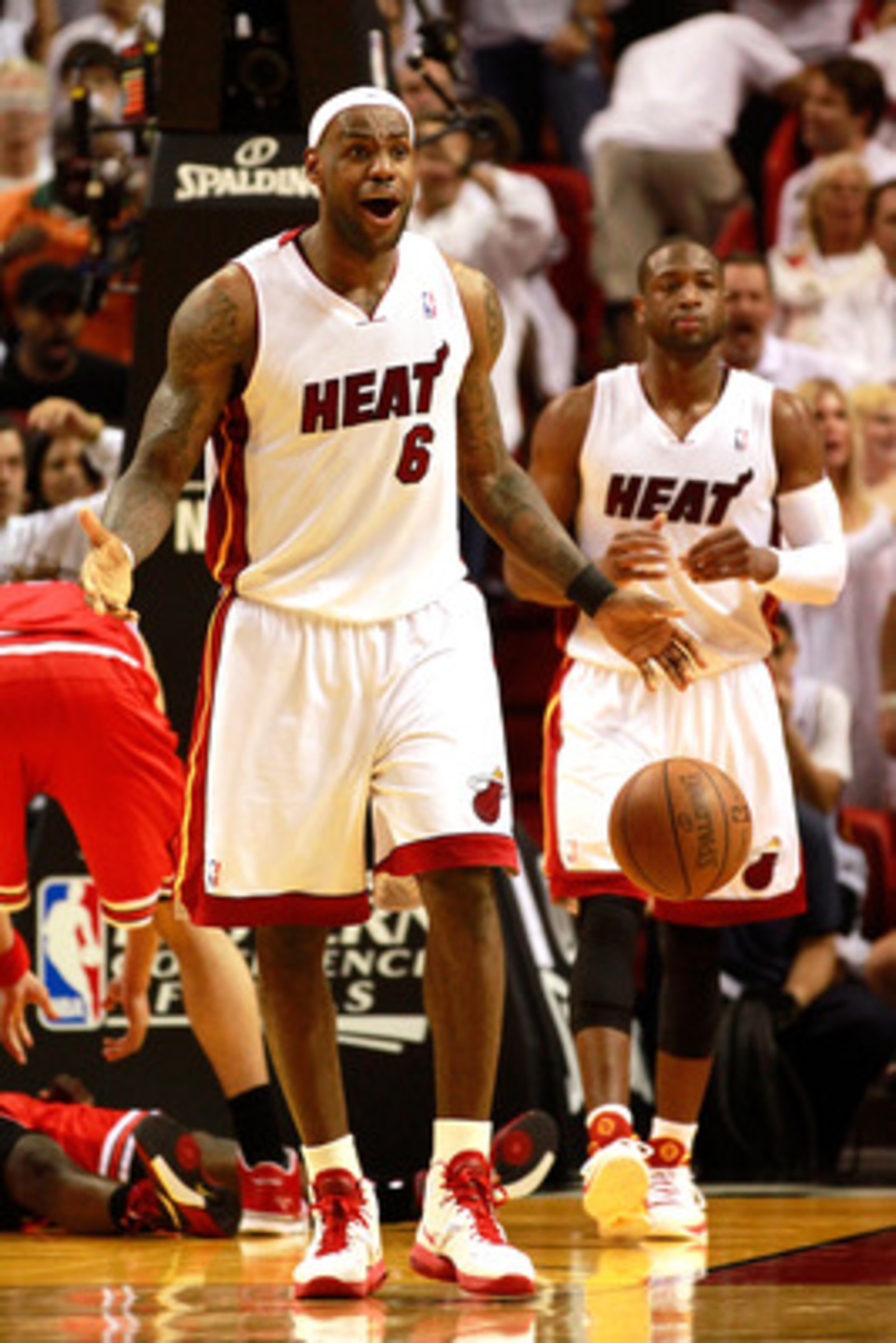 MIAMI, FL - MAY 24:  LeBron James #6 of the Miami Heat reacts against the Chicago Bulls in Game Four of the Eastern Conference Finals during the 2011 NBA Playoffs on May 24, 2011 at American Airlines Arena in Miami, Florida. Recording artist Drake NOTE TO
