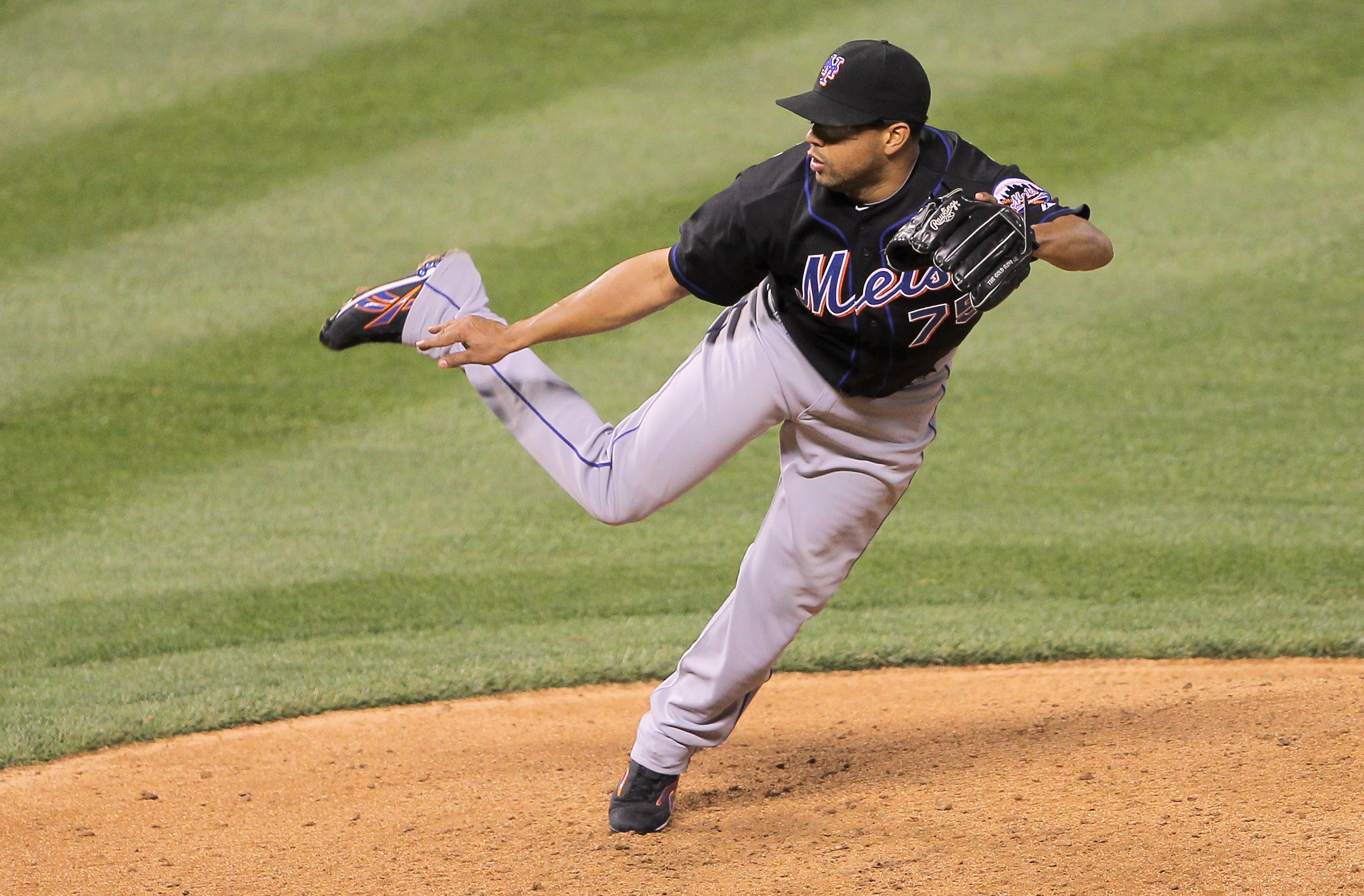 DENVER, CO - MAY 10:  Francisco Rodriguez #75 of the New York Mets pitches in the ninth inning against the Colorado Rockies at Coors Field on May 10, 2011 in Denver, Colorado. Rodriguez earned a save as the Mets defeated the Rockies 4-3.  (Photo by Doug P