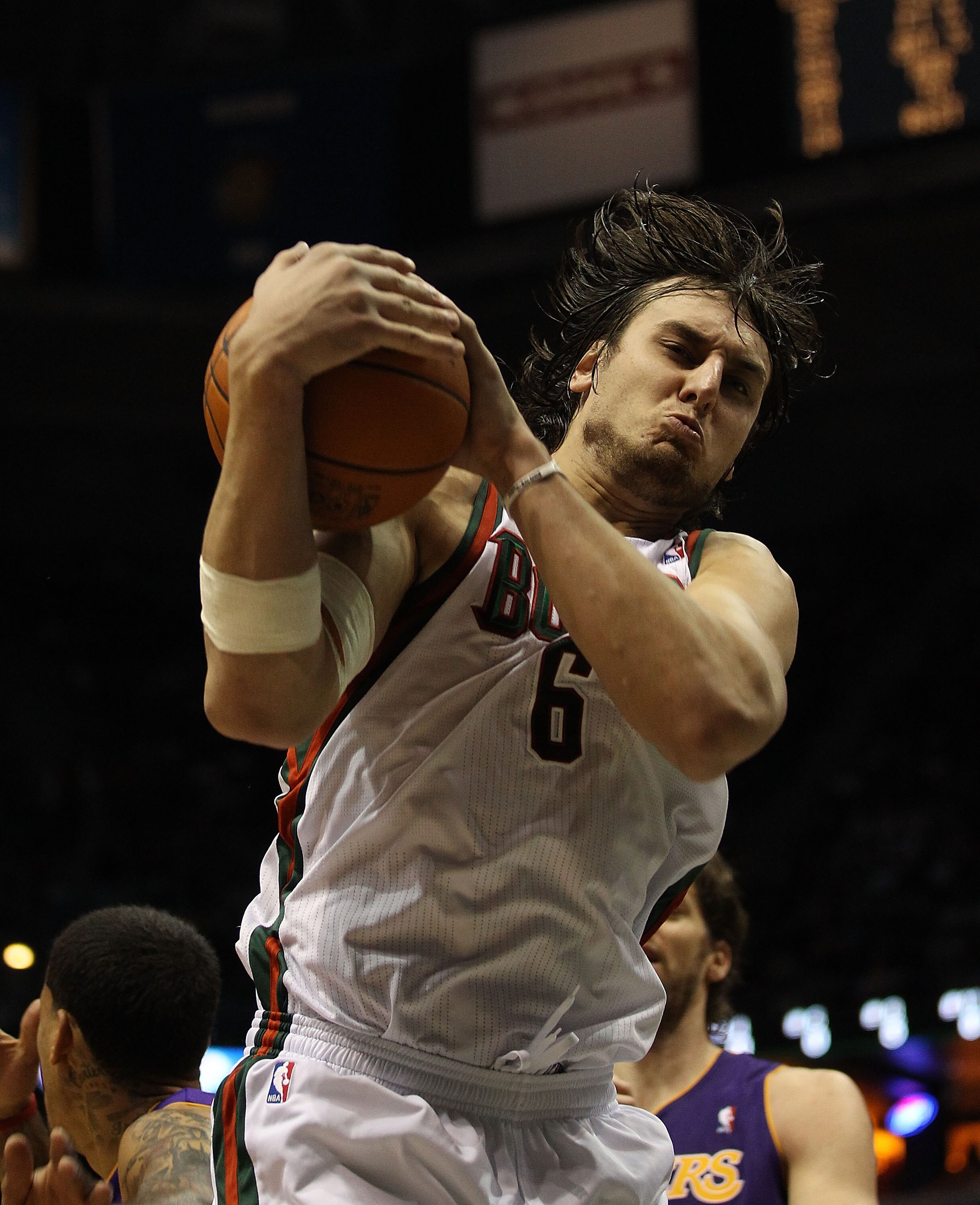 MILWAUKEE - NOVEMBER 16: Andrew Bogut #6 of the Milwaukee Bucks grabs a rebound against the Los Angeles Lakers at the Bradley Center on November 16, 2010 in Milwaukee, Wisconsin. The Lakers defeated the Bucks 118-107. NOTE TO USER: User expressly acknowle