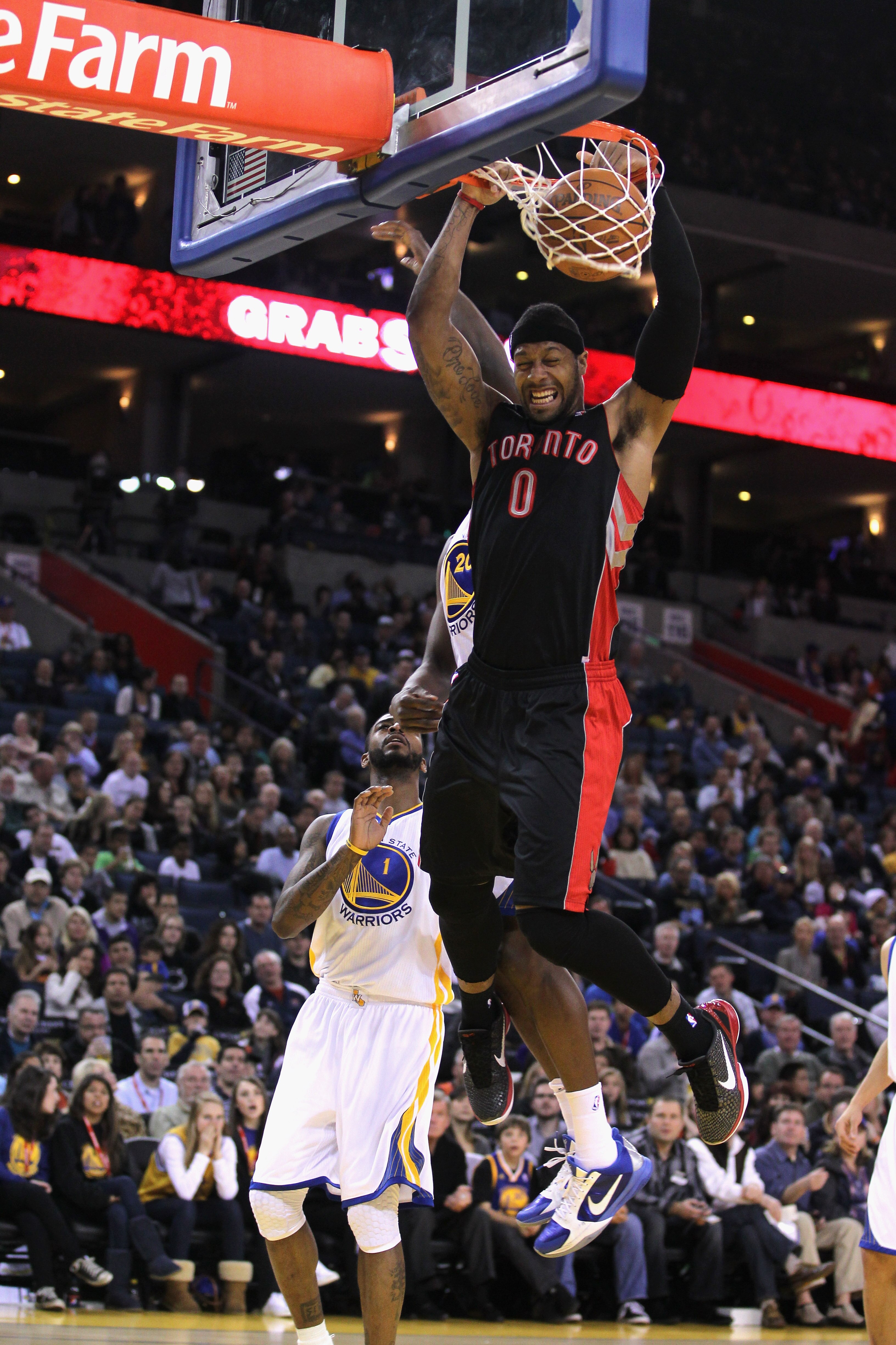 OAKLAND, CA - MARCH 25:  James Johnson #0 of the Toronto Raptors in action against the Golden State Warriors at Oracle Arena on March 25, 2011 in Oakland, California. NOTE TO USER: User expressly acknowledges and agrees that, by downloading and or using t