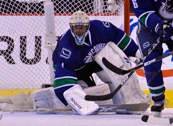 VANCOUVER, CANADA - MAY 24:  Goaltender Roberto Luongo #1 of the Vancouver Canucks defends his net in Game Five of the Western Conference Finals against the San Jose Sharks during the 2011 Stanley Cup Playoffs at Rogers Arena on May 24, 2011 in Vancouver,