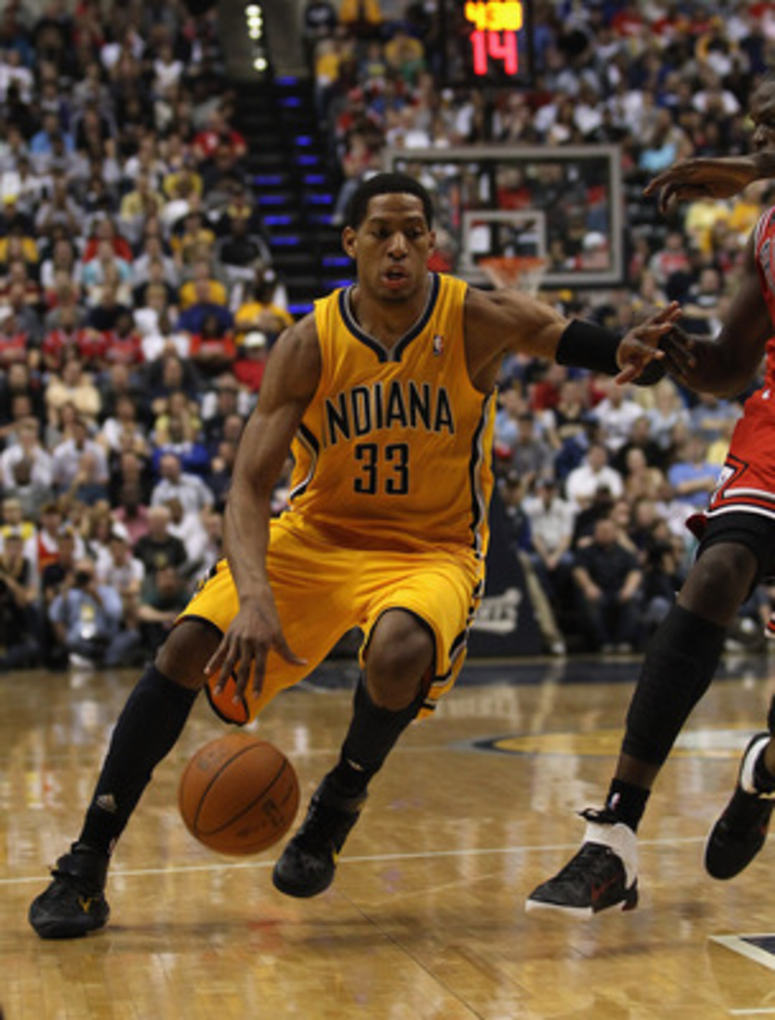 INDIANAPOLIS, IN - APRIL 23: Danny Granger #33 of the Indiana Pacers drives against the Chicago Bulls in Game Four of the Eastern Conference Quarterfinals in the 2011 NBA Playoffs at Conseco Fieldhouse on April 23, 2011 in Indianapolis, Indiana. The Pacer INDIANAPOLIS, IN - APRIL 23: Danny Granger #33 of the Indiana Pacers drives against the Chicago Bulls in Game Four of the Eastern Conference Quarterfinals in the 2011 NBA Playoffs at Conseco Fieldhouse on April 23, 2011 in Indianapolis, Indiana. The Pacer