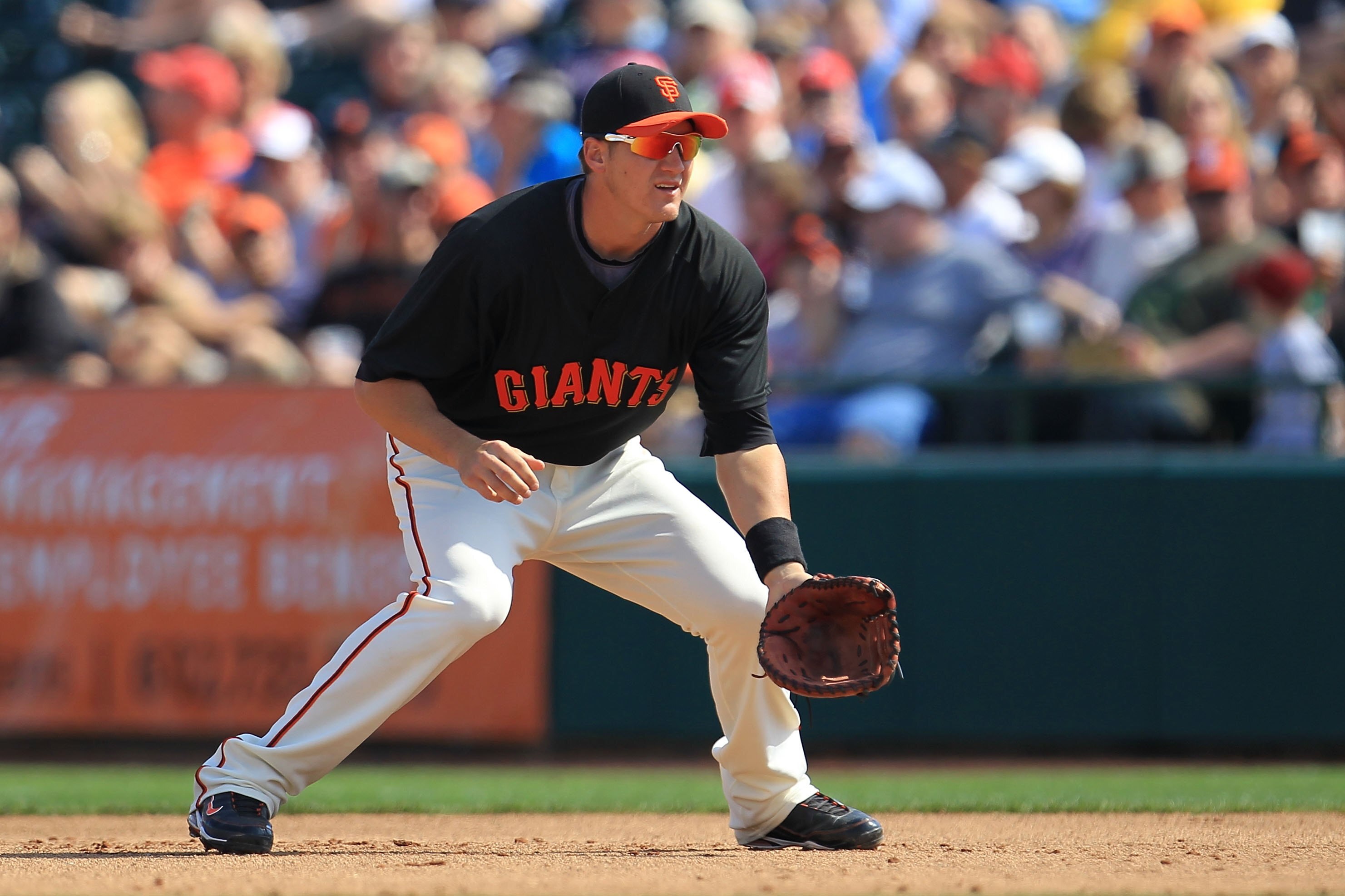 SCOTTSDALE, AZ - MARCH 04:  Brett Pill #35 of the San Francisco Giants fields against the Milwaukee Brewers during a spring training game at Scottsdale Stadium on March 4, 2010 in Scottsdale, Arizona.  (Photo by Chris McGrath/Getty Images)