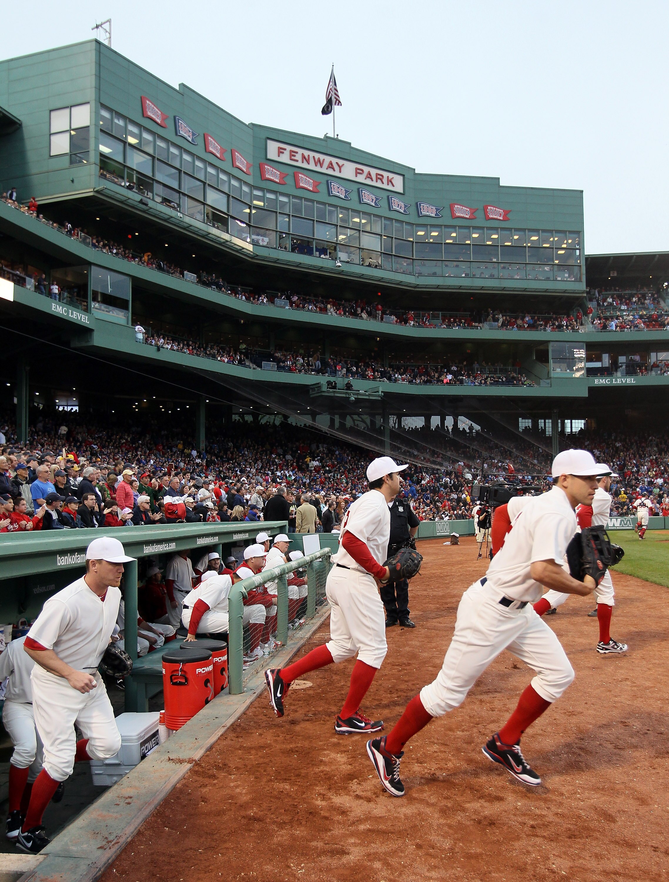 BOSTON, MA - MAY 21:  The Boston Red Sox take the field for the game against the Chicago Cubs on May 21, 2011 at Fenway Park in Boston, Massachusetts. Tonight the Chicago Cubs and the Boston Red Sox are wearing replica uniforms from 1918. Before this seri