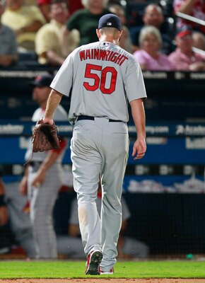 ATLANTA - SEPTEMBER 09:  Starting pitcher Adam Wainwright #50 of the St. Louis Cardinals walks off the field at the end of the eighth inning against the Atlanta Braves at Turner Field on September 9, 2010 in Atlanta, Georgia.  (Photo by Kevin C. Cox/Getty