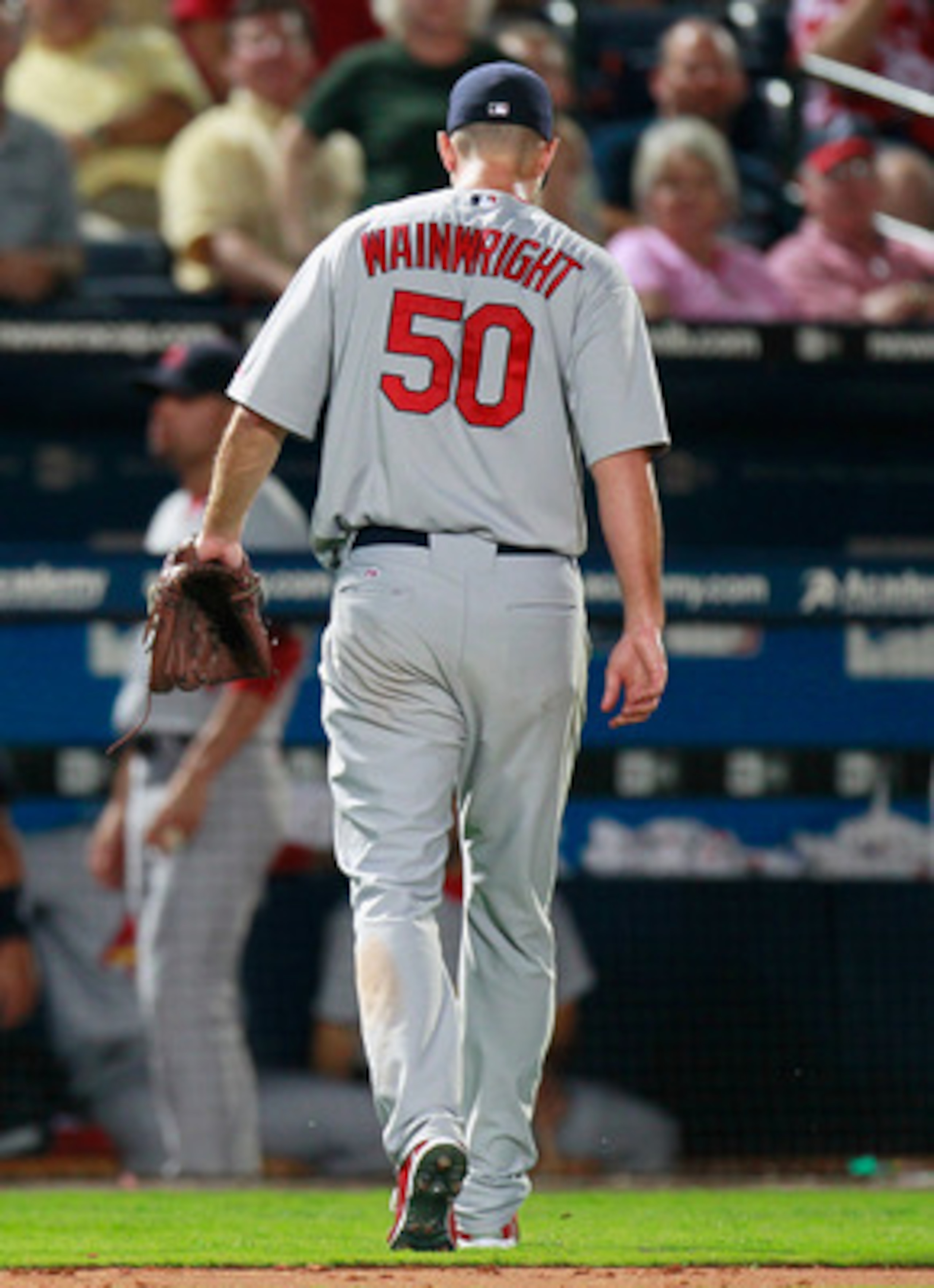 ATLANTA - SEPTEMBER 09: Starting pitcher Adam Wainwright #50 of the St. Louis Cardinals walks off the field at the end of the eighth inning against the Atlanta Braves at Turner Field on September 9, 2010 in Atlanta, Georgia. (Photo by Kevin C. Cox/Getty ATLANTA - SEPTEMBER 09: Starting pitcher Adam Wainwright #50 of the St. Louis Cardinals walks off the field at the end of the eighth inning against the Atlanta Braves at Turner Field on September 9, 2010 in Atlanta, Georgia. (Photo by Kevin C. Cox/Getty