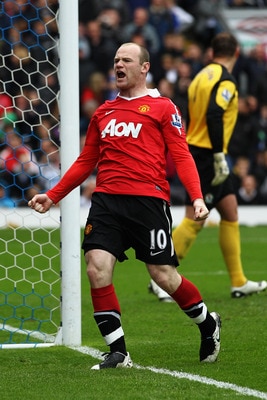 BLACKBURN, ENGLAND - MAY 14:  Wayne Rooney of Manchester United celebrates after scoring a penalty during the Barclays Premier League match between Blackburn Rovers and Manchester United at Ewood park on May 14, 2011 in Blackburn, England.  (Photo by Dean