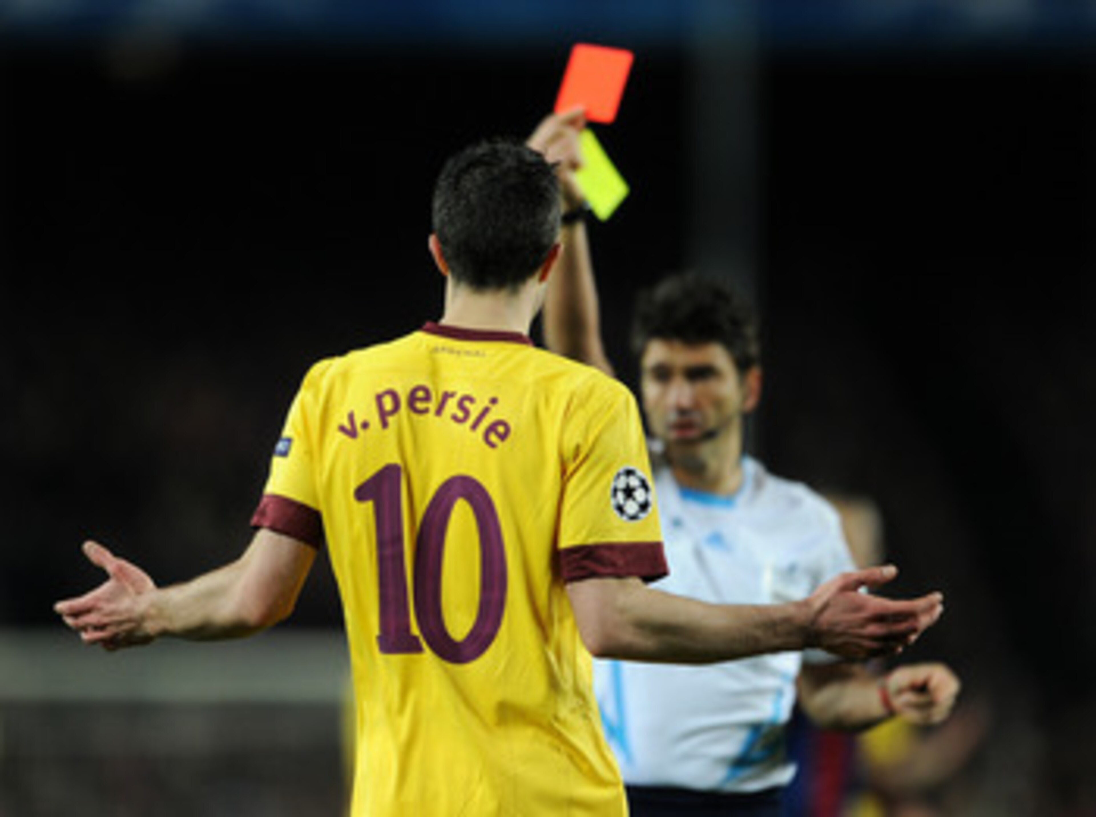 BARCELONA, SPAIN - MARCH 08: Robin van Persie of Arsenal reacts as referee Massimo Busacca shows his a red card during the UEFA Champions League round of 16 second leg match between Barcelona and Arsenal on March 8, 2011 in Barcelona, Spain. (Photo by J BARCELONA, SPAIN - MARCH 08: Robin van Persie of Arsenal reacts as referee Massimo Busacca shows his a red card during the UEFA Champions League round of 16 second leg match between Barcelona and Arsenal on March 8, 2011 in Barcelona, Spain. (Photo by J