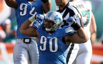 MIAMI - DECEMBER 26:  Lineman Ndamukong Sue #90 celebrates a sack against the Miami Dolphins at Sun Life Stadium on December 26, 2010 in Miami, Florida.  (Photo by Marc Serota/Getty Images)