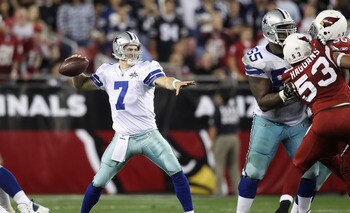 GLENDALE, AZ - DECEMBER 25:  Quarterback Stephen McGee #7 of the Dallas Cowboys scrambles with the football during the NFL game against the Arizona Cardinals at the University of Phoenix Stadium on December 25, 2010 in Glendale, Arizona.  The Cardinals de