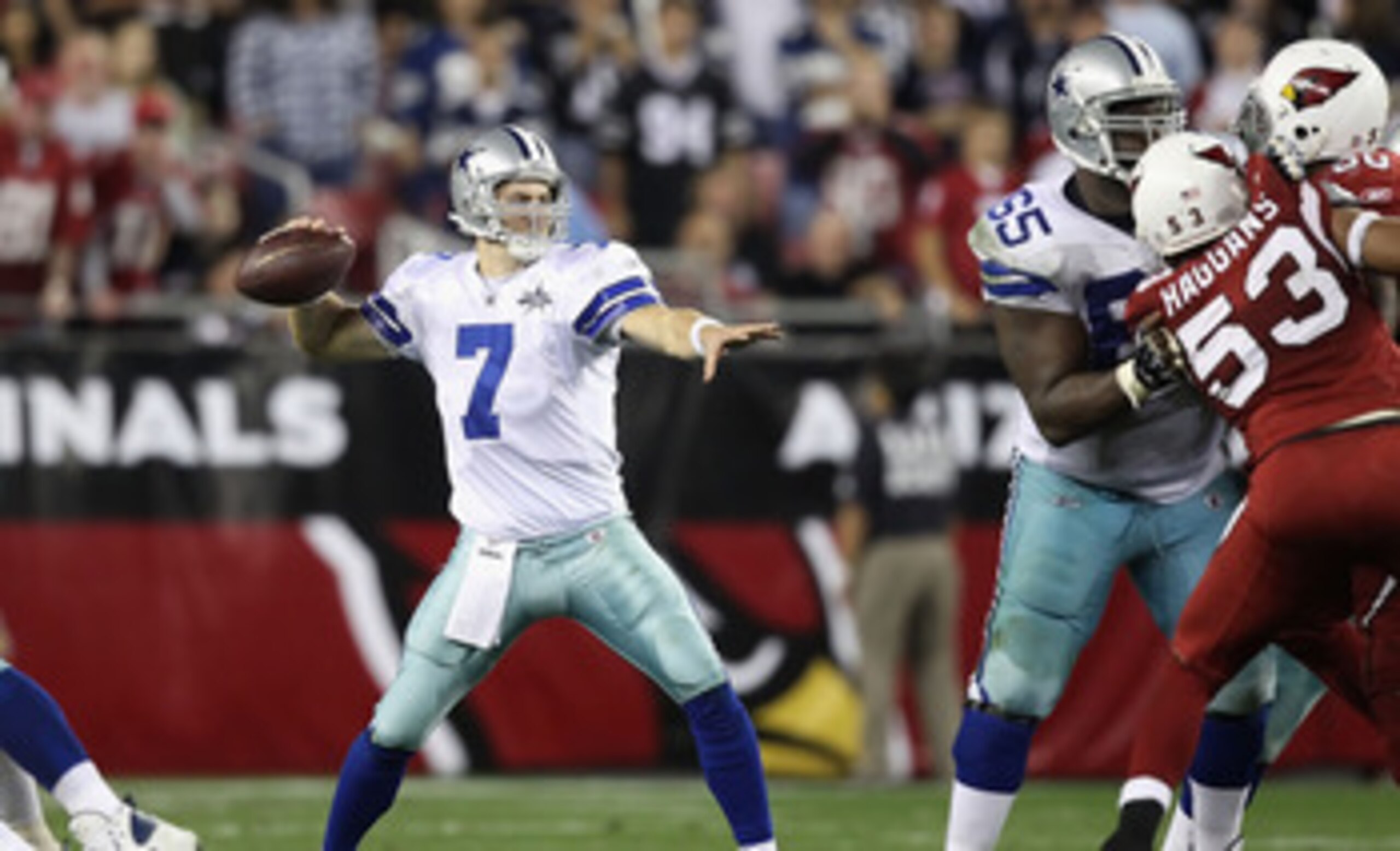 GLENDALE, AZ - DECEMBER 25:  Quarterback Stephen McGee #7 of the Dallas Cowboys scrambles with the football during the NFL game against the Arizona Cardinals at the University of Phoenix Stadium on December 25, 2010 in Glendale, Arizona.  The Cardinals de