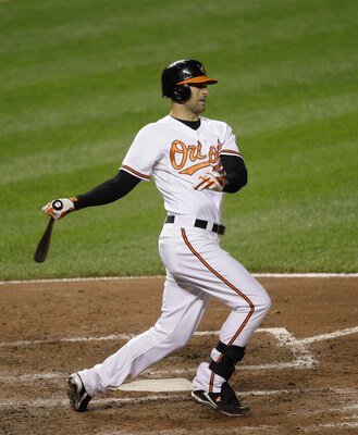 BALTIMORE, MD - MAY 25:  Nick Markakis #21 of the Baltimore Orioles at the plate against the Kansas City Royals at Oriole Park at Camden Yards on May 25, 2011 in Baltimore, Maryland.  (Photo by Rob Carr/Getty Images)