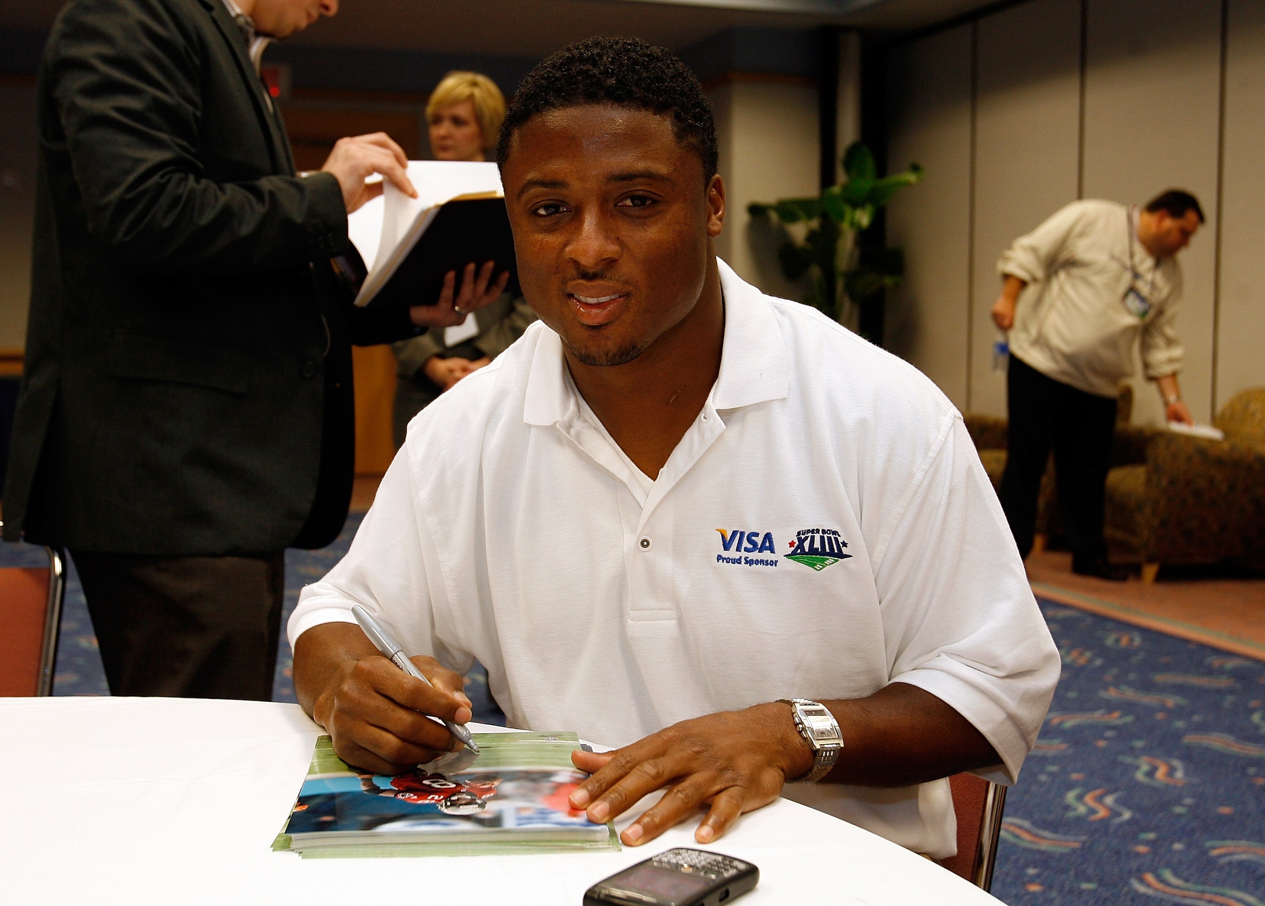 TAMPA, FL - JANUARY 26:  Running back Warrick Dunn of the Tampa Bay Buccaneers participates at the VISA 'Financial Football' Super Bowl at the Tampa Convention Center on January 26, 2009 in Tampa, Florida.  (Photo by J. Meric/Getty Images for VISA)