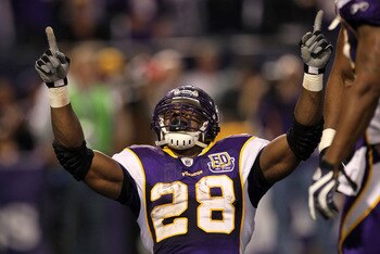 MINNEAPOLIS - NOVEMBER 07:  Running back Adrian Peterson #28 of the Minnesota Vikings celebrates after his four yard touchdown run brought the Vikings within a touchdown of the Arizona Cardinals in the fourth quarter at Hubert H. Humphrey Metrodome on Nov
