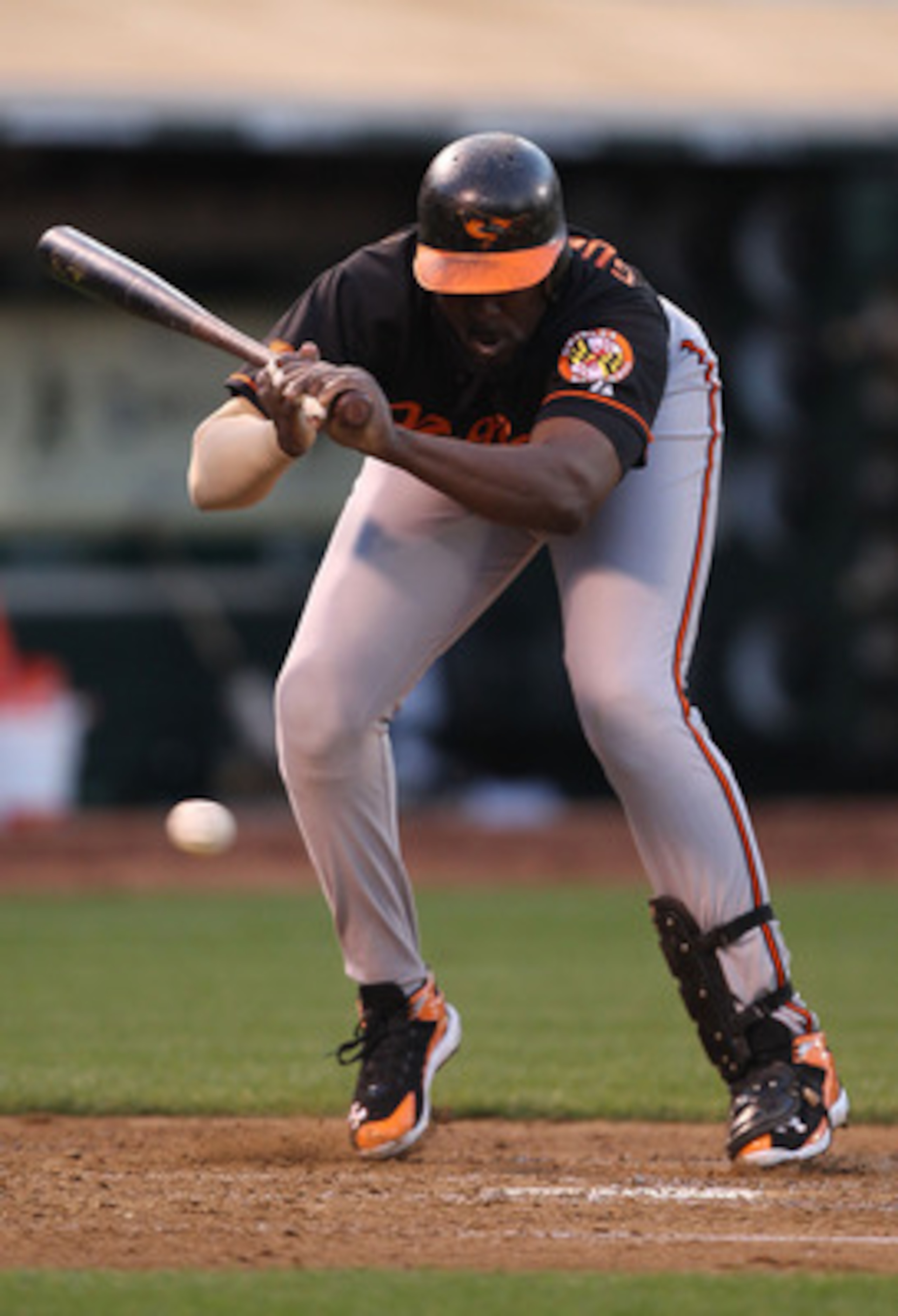 OAKLAND, CA - MAY 27: Vladimir Guerrero #27 of the Baltimore Orioles is hit by a pitch against the Oakland Athletics during a Major League Baseball game at the Oakland-Alameda County Coliseum on May 27, 2011 in Oakland, California. (Photo by Jed Jacobsoh OAKLAND, CA - MAY 27: Vladimir Guerrero #27 of the Baltimore Orioles is hit by a pitch against the Oakland Athletics during a Major League Baseball game at the Oakland-Alameda County Coliseum on May 27, 2011 in Oakland, California. (Photo by Jed Jacobsoh