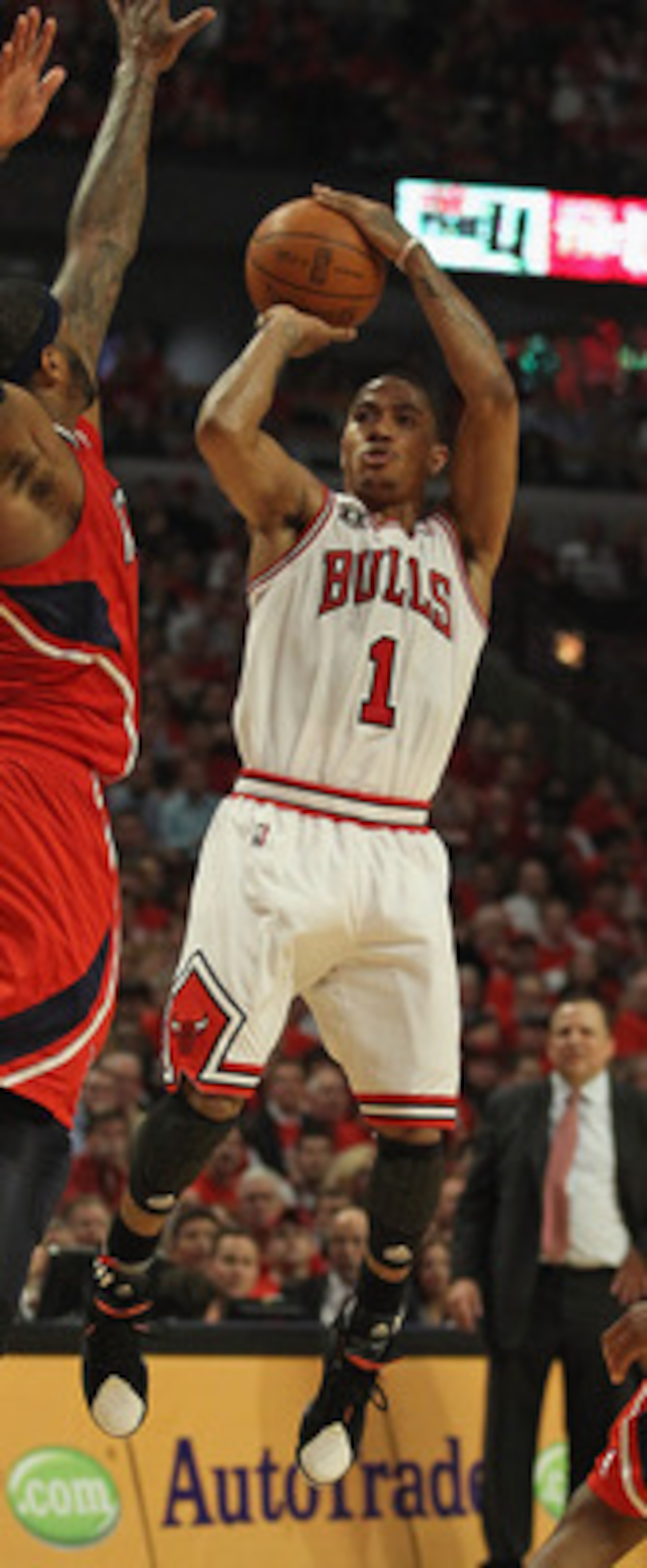 CHICAGO, IL - MAY 10: Derrick Rose #1 of the Chicago Bulls puts up a shot against Josh Smith #5 of the Atlanta Hawks in Game Five of the Eastern Conference Semifinals in the 2011 NBA Playoffs at the United Center on May 10, 2011 in Chicago, Illinois. The