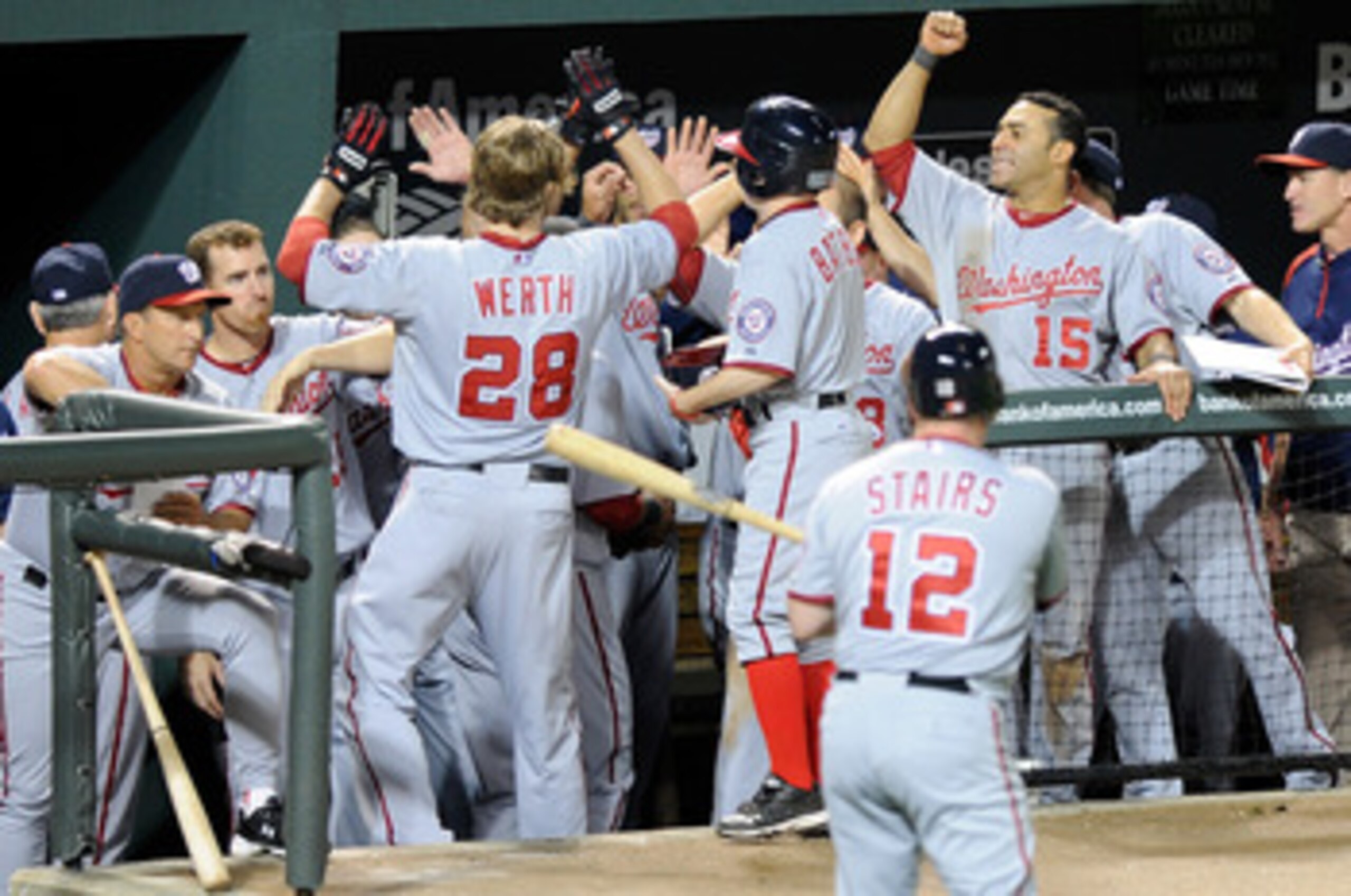 BALTIMORE, MD - MAY 20: Jayson Werth #28 of the Washington Nationals is congratulated by teammates after hitting a home run in the fifth inning against the Baltimore Orioles at Oriole Park at Camden Yards on May 20, 2011 in Baltimore, Maryland. Washingto BALTIMORE, MD - MAY 20: Jayson Werth #28 of the Washington Nationals is congratulated by teammates after hitting a home run in the fifth inning against the Baltimore Orioles at Oriole Park at Camden Yards on May 20, 2011 in Baltimore, Maryland. Washingto
