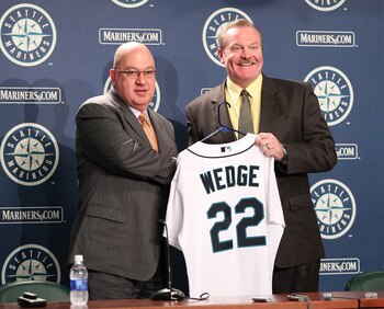 SEATTLE - OCTOBER 19:  New manager Eric Wedge (R) of the Seattle Mariners is introduced to the media by Executive Vice President & GM Jack Zduriencik at Safeco Field on October 19, 2010 in Seattle, Washington. (Photo by Otto Greule Jr/Getty Images)