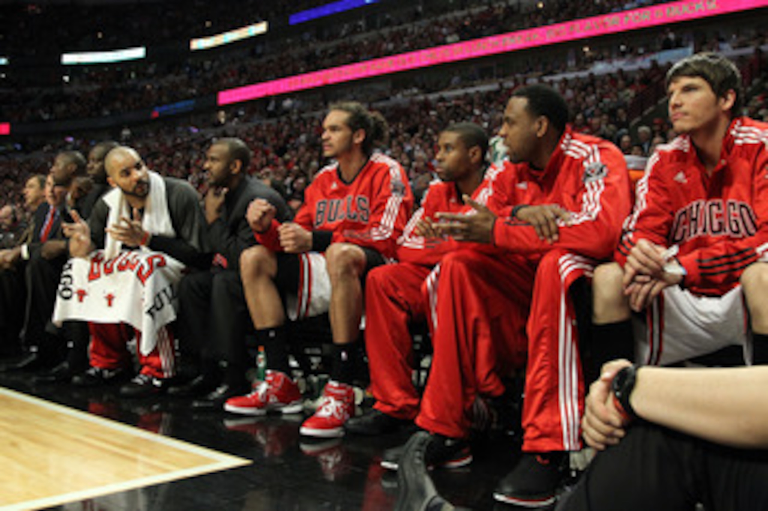 CHICAGO, IL - MAY 26:  Chicago Bulls players look on from the bench including Carlos Boozer #5, Joakim Noah #13 (C) and Kyle Korver #26 late in the fourth quarter against the Miami Heat in Game Five of the Eastern Conference Finals during the 2011 NBA Pla