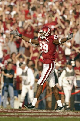 NORMAN, OK - NOVEMBER 1:  Wide receiver Will Peoples #29 of the Oklahoma Sooners pumps up the home crowd during the game against the Oklahoma State Cowboys on November 1, 2003 at Memorial Stadium in Norman, Oklahoma. Oklahoma defeated Oklahoma State 52-9.