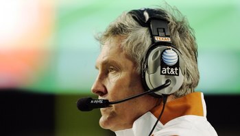 AUSTIN, TX - OCTOBER 10:  Head coach Mack Brown of the Texas Longhorns calls in a play against the Colorado Buffaloes on October 10, 2009 at Darrell K Royal-Texas Memorial Stadium in Austin, Texas.  Texas won 38-14.  (Photo by Brian Bahr/Getty Images)