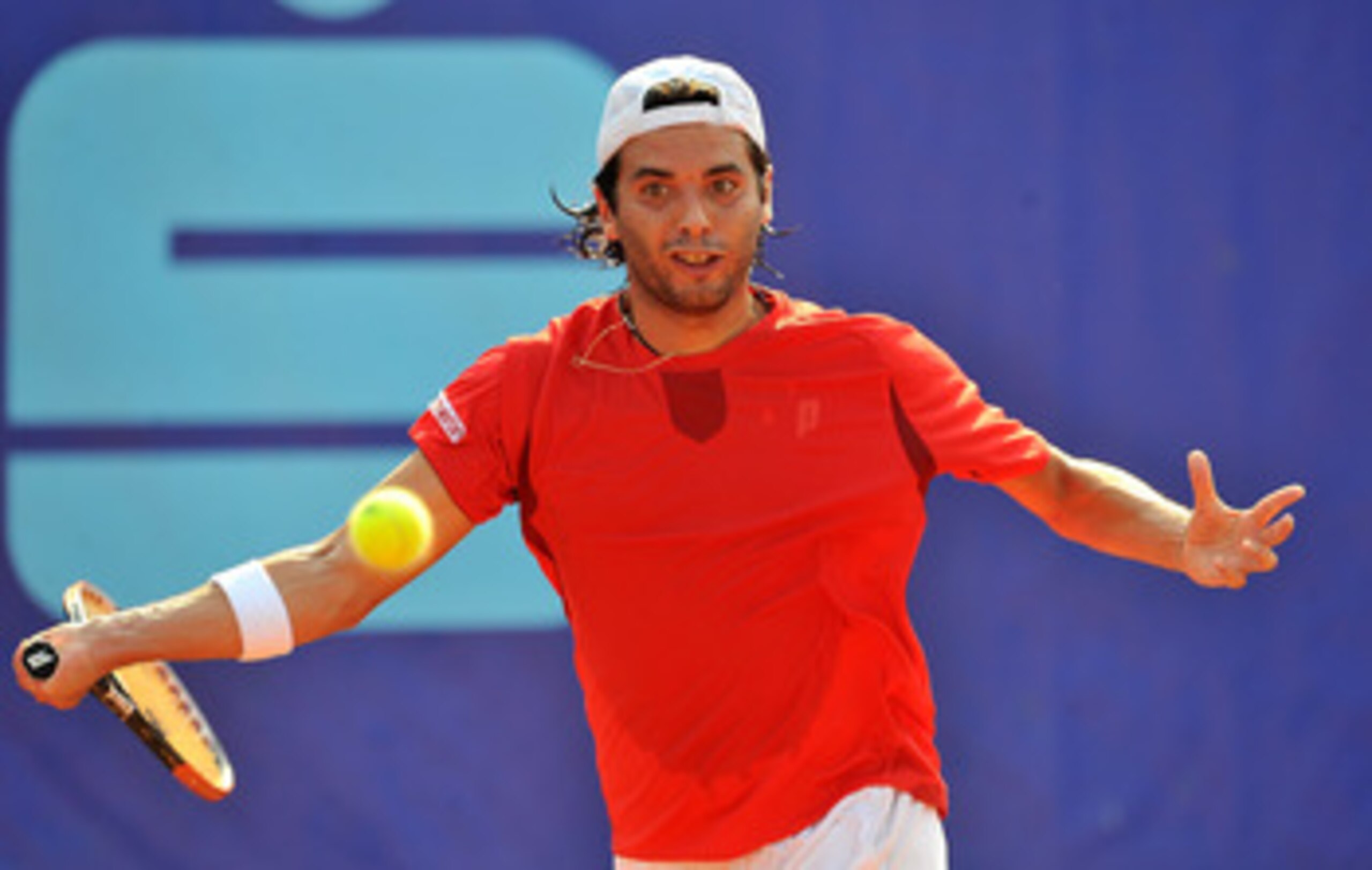 BUCHAREST, ROMANIA - SEPTEMBER 25:  Albert Montanes of Spain in action against Fabio Fognini of Italy during their Quarter Final match of the BCR Open Romania at the BNR Arena on September 25, 2009 in Bucharest, Romania.  (Photo by Christopher Lee/Getty I