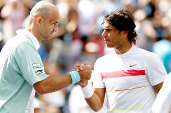 INDIAN WELLS, CA - MARCH 20:  Ivan Ljubicic (L) of Croatia is congratulated at the net by Rafael Nadal of Spain after their match during the semifinals of the BNP Paribas Open on March 20, 2010 at the Indian Wells Tennis Garden in Indian Wells, California