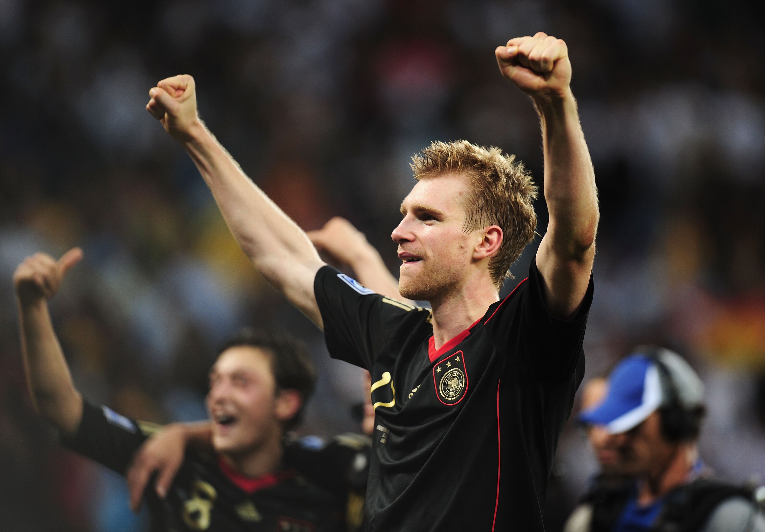 CAPE TOWN, SOUTH AFRICA - JULY 03:  Per Mertesacker of Germany celebrates victory following the 2010 FIFA World Cup South Africa Quarter Final match between Argentina and Germany at Green Point Stadium on July 3, 2010 in Cape Town, South Africa.  (Photo b