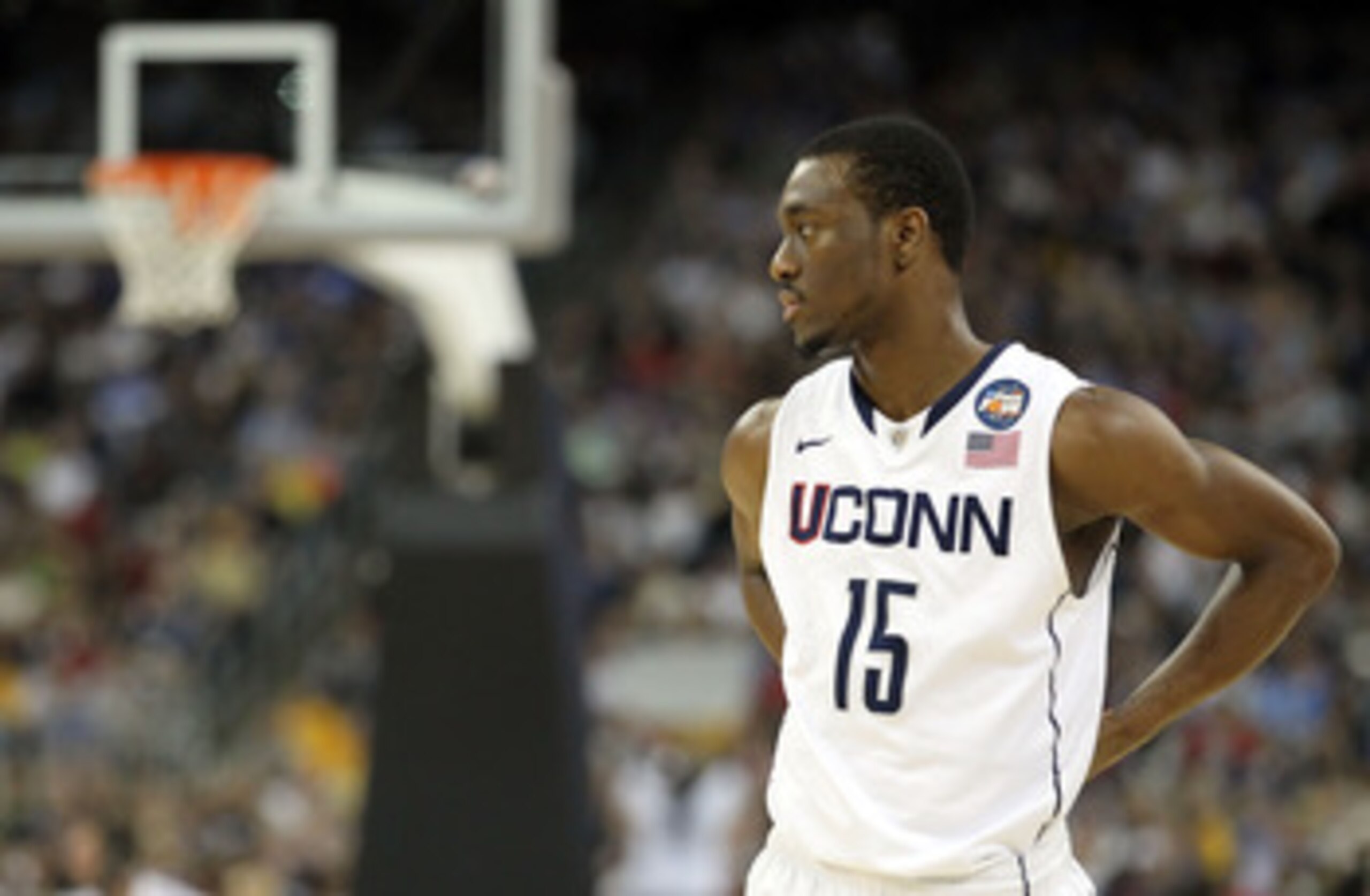 HOUSTON, TX - APRIL 04: Kemba Walker #15 of the Connecticut Huskies looks on against the Butler Bulldogs during the National Championship Game of the 2011 NCAA Division I Men's Basketball Tournament at Reliant Stadium on April 4, 2011 in Houston, Texas. HOUSTON, TX - APRIL 04: Kemba Walker #15 of the Connecticut Huskies looks on against the Butler Bulldogs during the National Championship Game of the 2011 NCAA Division I Men's Basketball Tournament at Reliant Stadium on April 4, 2011 in Houston, Texas.