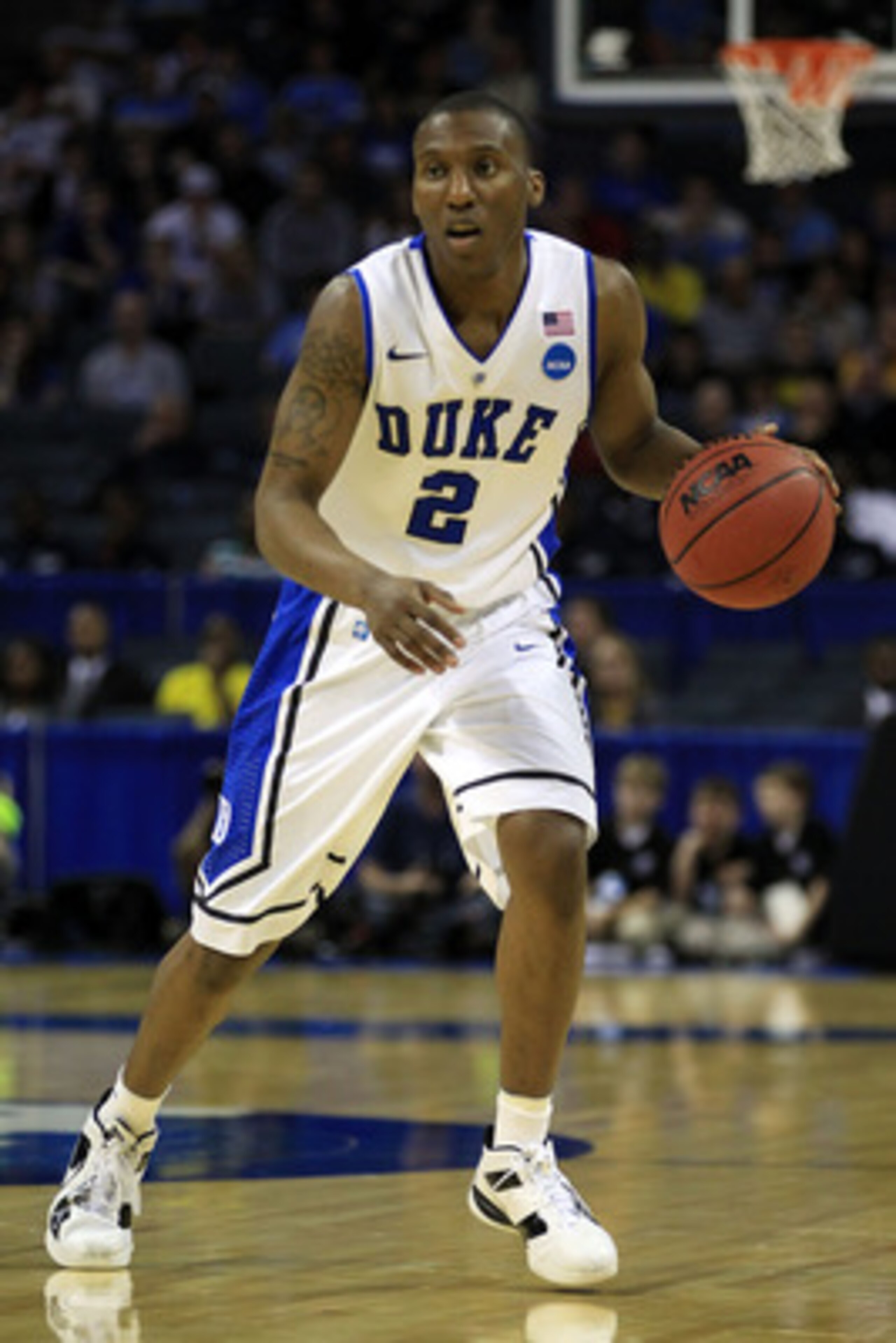 CHARLOTTE, NC - MARCH 20: Nolan Smith #2 of the Duke Blue Devils moves the ball while taking on the Michigan Wolverines during the third round of the 2011 NCAA men's basketball tournament at Time Warner Cable Arena on March 20, 2011 in Charlotte, North C CHARLOTTE, NC - MARCH 20: Nolan Smith #2 of the Duke Blue Devils moves the ball while taking on the Michigan Wolverines during the third round of the 2011 NCAA men's basketball tournament at Time Warner Cable Arena on March 20, 2011 in Charlotte, North C
