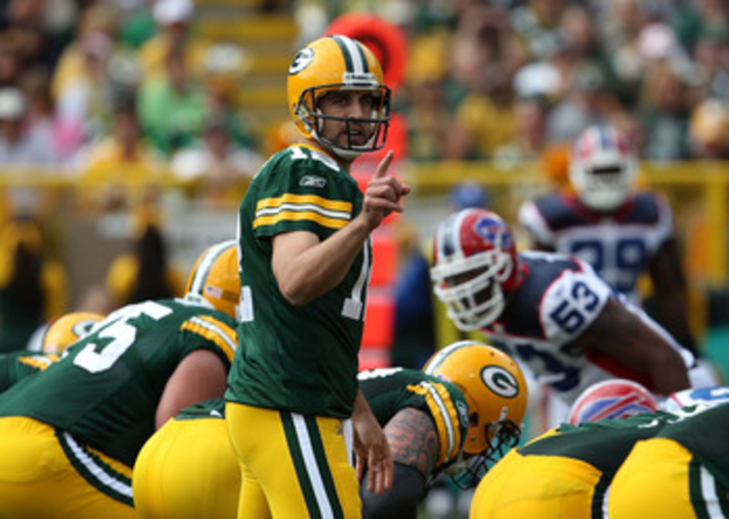 GREEN BAY, WI - SEPTEMBER 19: Aaron Rodgers #12 of the Green Bay Packers calls signals against the Buffalo Bills at Lambeau Field on September 19, 2010 in Green Bay, Wisconsin. The Packers defeated the Bills 34-7. (Photo by Jonathan Daniel/Getty Images)