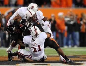 CORVALLIS, OR - OCTOBER 10: Running back Jacquizz Rodgers #1 of the Oregon State Beavers is tackled by linebacker Shayne Skov #11 and cornerback Richard Sherman #9 of Stanford Cardinals in the third quarter of the game at Reser Stadium on October 10, 2009