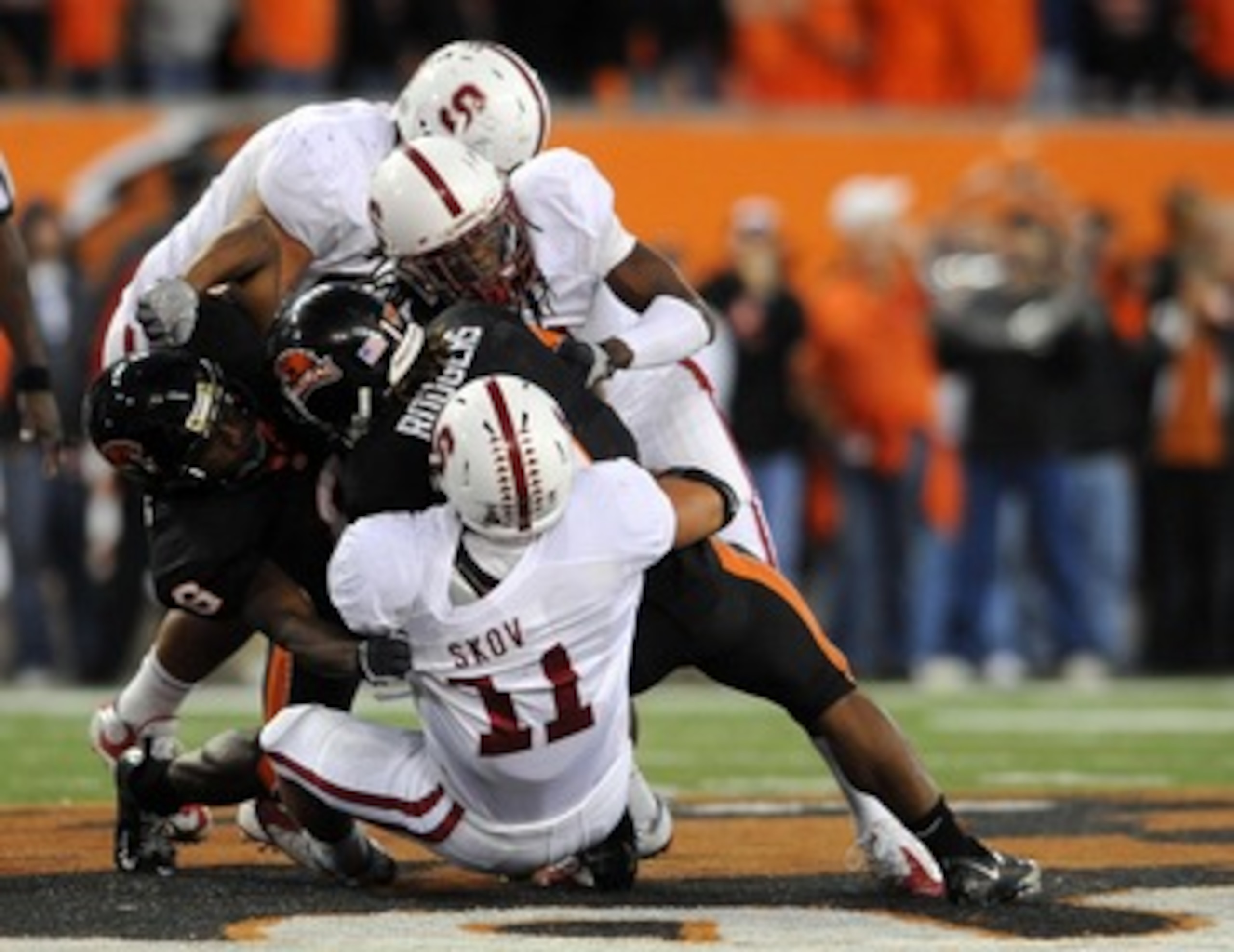 CORVALLIS, OR - OCTOBER 10: Running back Jacquizz Rodgers #1 of the Oregon State Beavers is tackled by linebacker Shayne Skov #11 and cornerback Richard Sherman #9 of Stanford Cardinals in the third quarter of the game at Reser Stadium on October 10, 2009