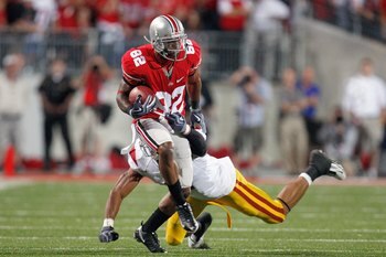 COLUMBUS, OH - SEPTEMBER 12: Ray Small #82 of the Ohio State Buckeyes carries the ball during the game against the Southern California Trojans on September 12, 2009 at Ohio Stadium in Columbus, Ohio. The Trojans defeated the Buckeyes 18-15. (Photo by Greg
