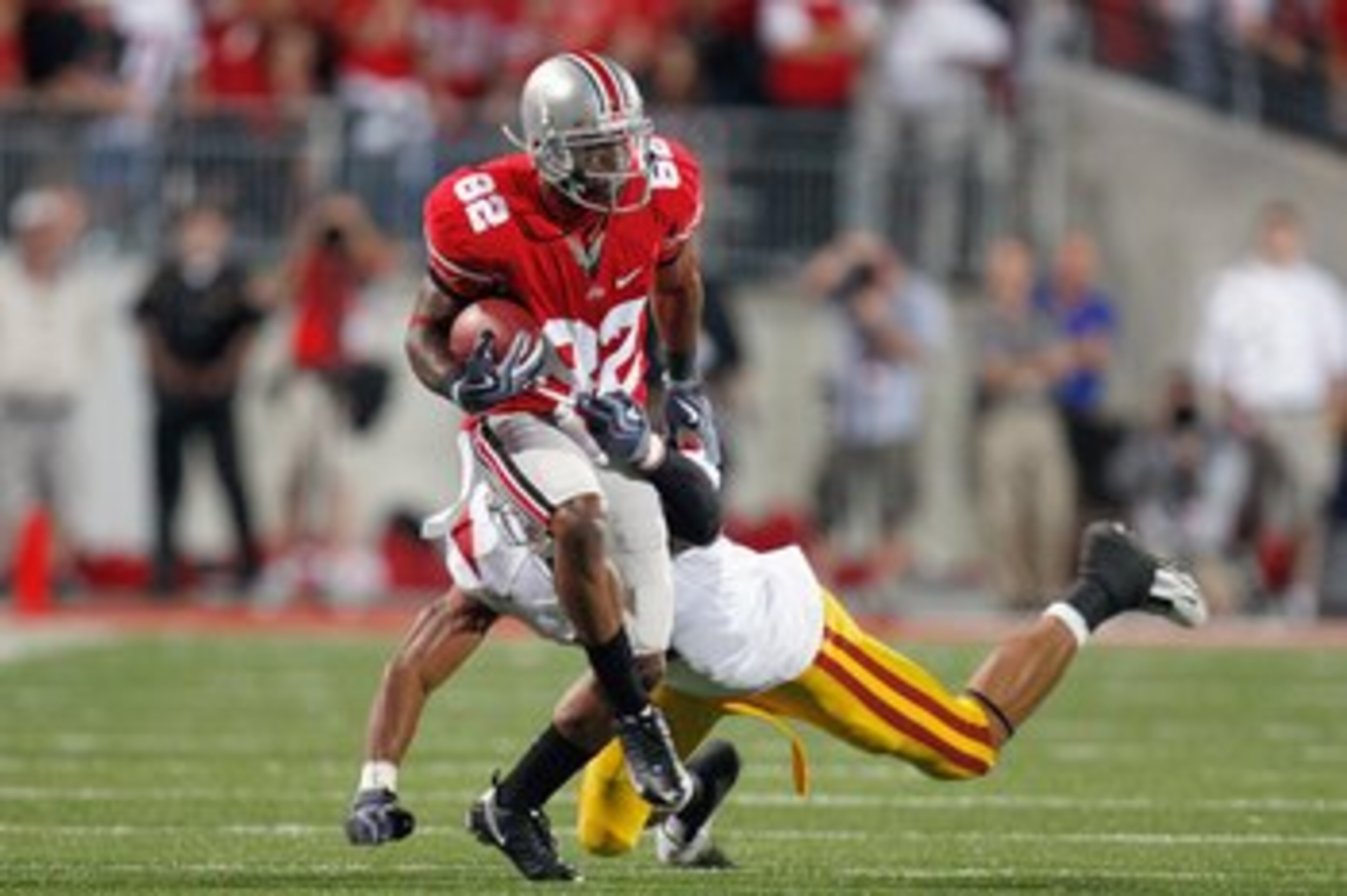COLUMBUS, OH - SEPTEMBER 12: Ray Small #82 of the Ohio State Buckeyes carries the ball during the game against the Southern California Trojans on September 12, 2009 at Ohio Stadium in Columbus, Ohio. The Trojans defeated the Buckeyes 18-15. (Photo by Greg