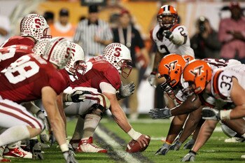 MIAMI, FL - JANUARY 03:  Center Chase Beeler #72 of the Stanford Cardinal readies the ball for the snap at the line of scrimmage against the Virginia Tech Hokies defense during the 2011 Discover Orange Bowl at Sun Life Stadium on January 3, 2011 in Miami,