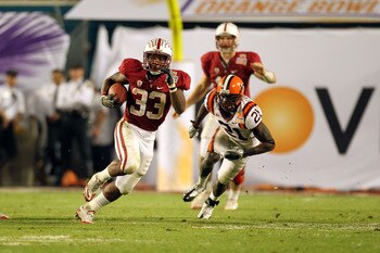 MIAMI, FL - JANUARY 03:  Stepfan Taylor #33 of the Stanford Cardinal runs the ball against the Virginai Tech Hokies during the 2011 Discover Orange Bowl at Sun Life Stadium on January 3, 2011 in Miami, Florida. Stanford won 40-12.  (Photo by Mike Ehrmann/