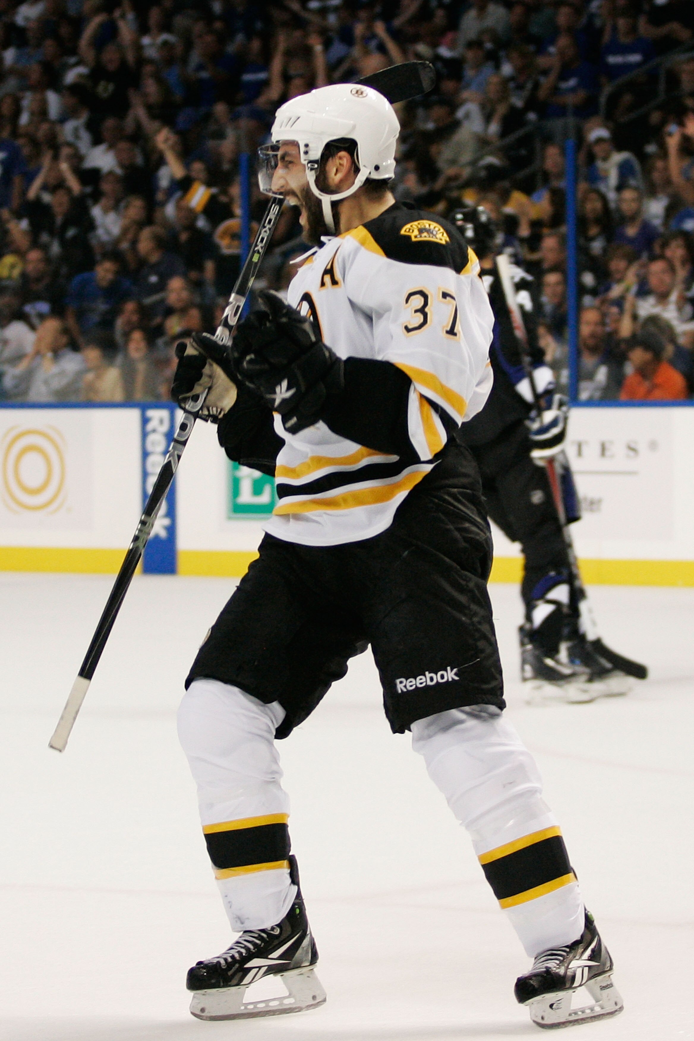 TAMPA, FL - MAY 21:  Patrice Bergeron #37 of the Boston Bruins celebrates his first period goal in Game Four of the Eastern Conference Finals against the Tampa Bay Lightning during the 2011 NHL Stanley Cup Playoffs at St Pete Times Forum on May 21, 2011 i