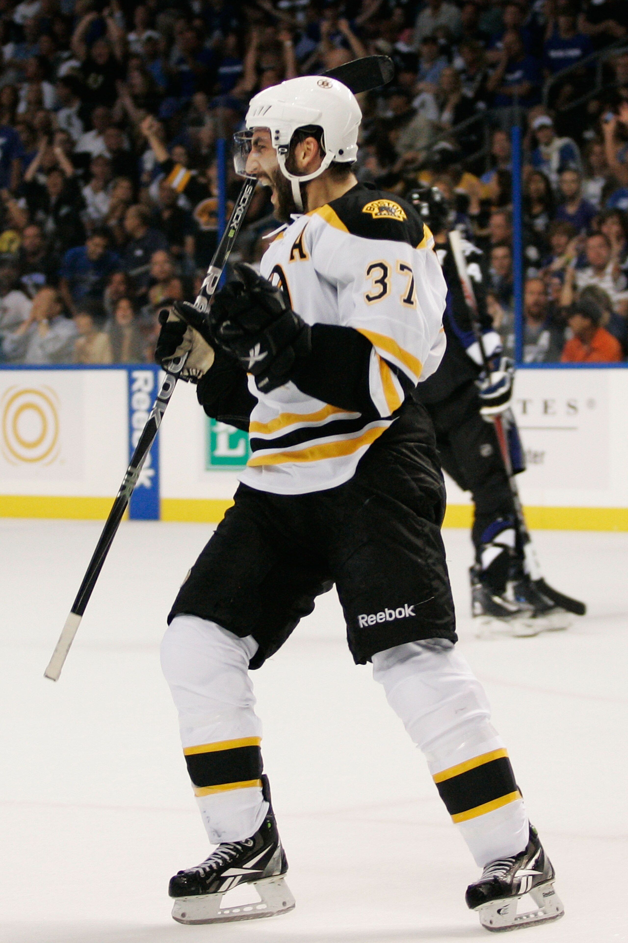 TAMPA, FL - MAY 21:  Patrice Bergeron #37 of the Boston Bruins celebrates his first period goal in Game Four of the Eastern Conference Finals against the Tampa Bay Lightning during the 2011 NHL Stanley Cup Playoffs at St Pete Times Forum on May 21, 2011 i